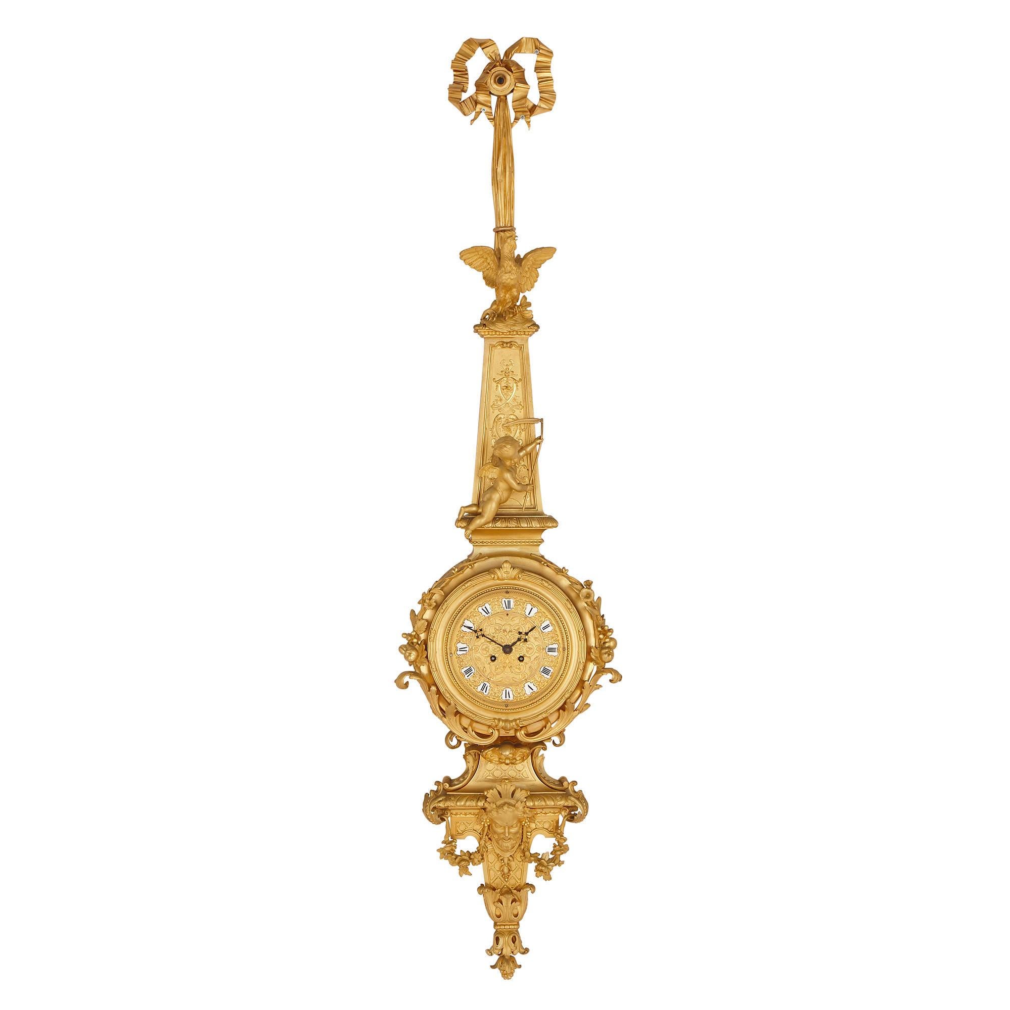 Cette étonnante paire d'horloge et de baromètre en bronze doré a été créée vers 1860 en France. Les deux ont été attribués à Raingo Frères, prestigieuse maison d'horlogerie du XIXe siècle. 

Fondée par le Belge Zacharie Joseph Raingo en 1813,