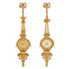 Reloj y barómetro de bronce dorado de la época de Napoleón III, atribuidos a Raingo Frères