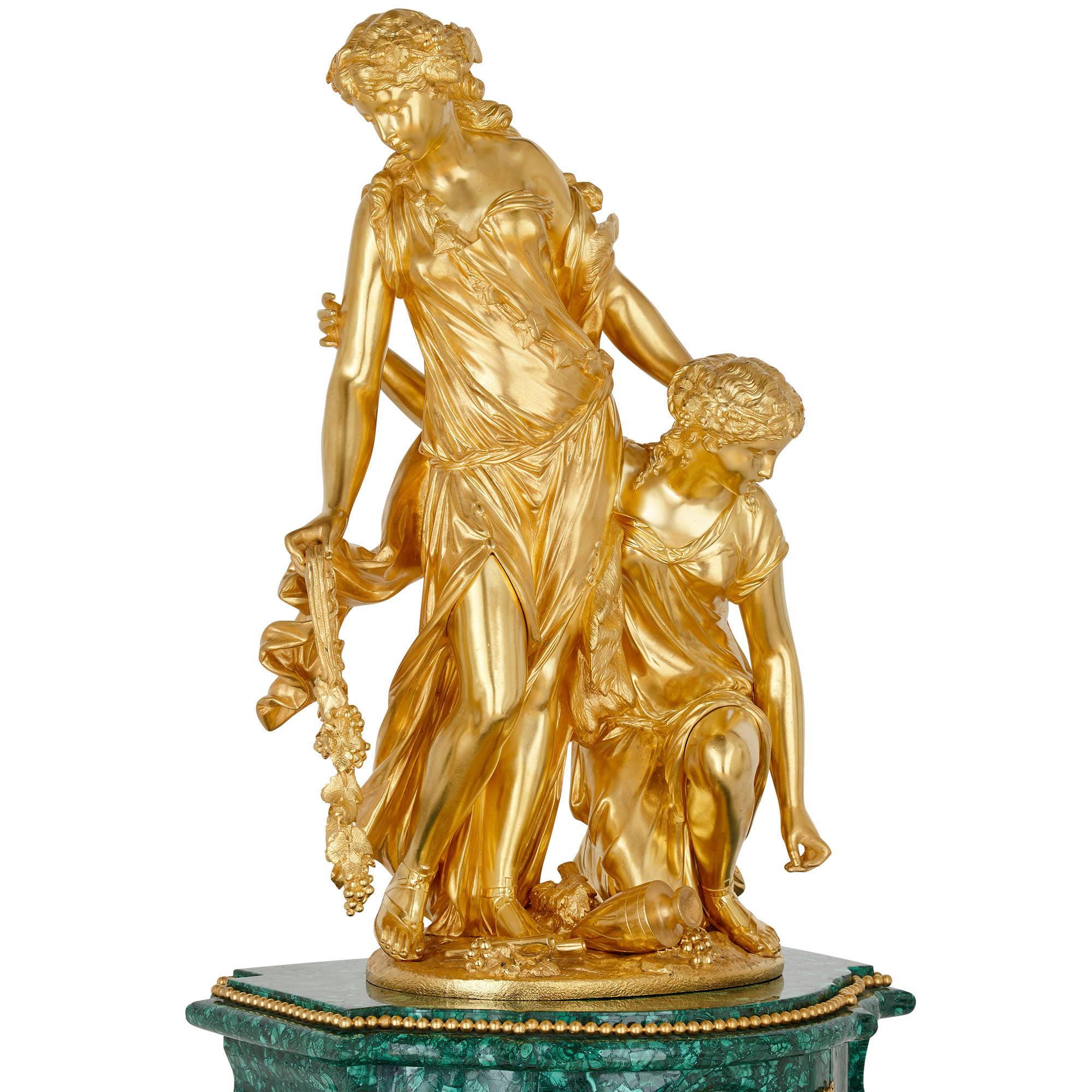 Napoleon III period neoclassical malachite and gilt bronze clock set by Picard
French, late 19th century
Measures: Clock: Height 72cm, width 46cm, depth 27cm
Candelabra: Height 78cm, width 31cm, depth 30cm

Comprising a central mantel clock and