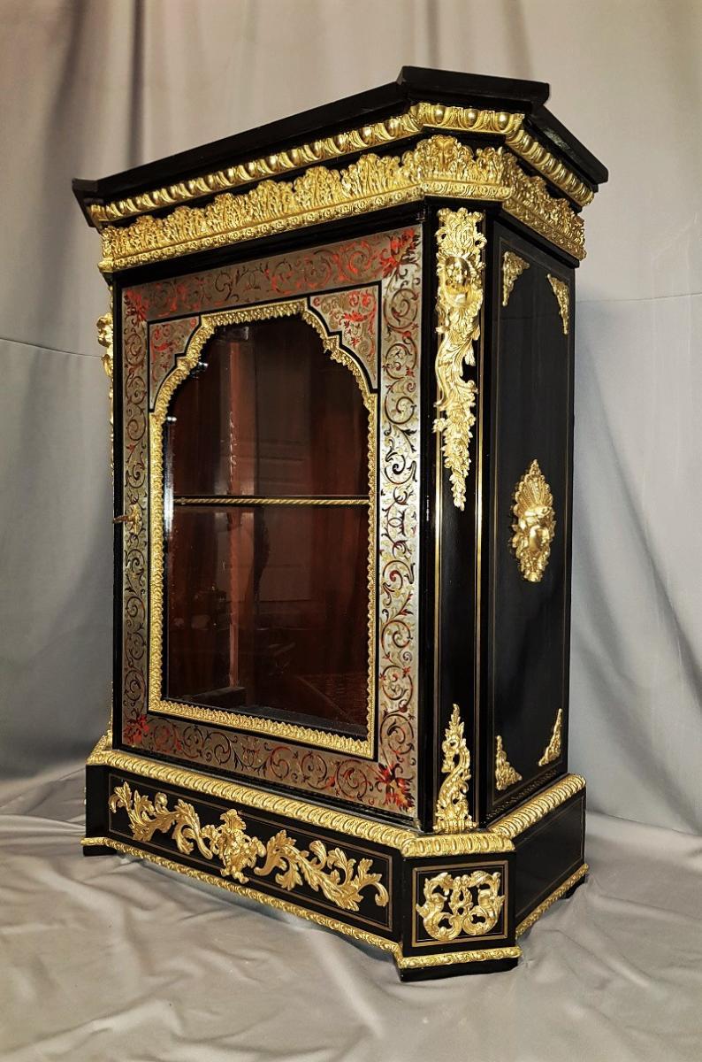Rare Napoleon III Boulle vitrine showcase cupboard cabinet by Pretot with support height in red tortoise shell , pewter, copper and brass marquetry, signed by Hyppolite Edme-Pretot, with a matching inlay, typical of Pretot's creations. Very rich