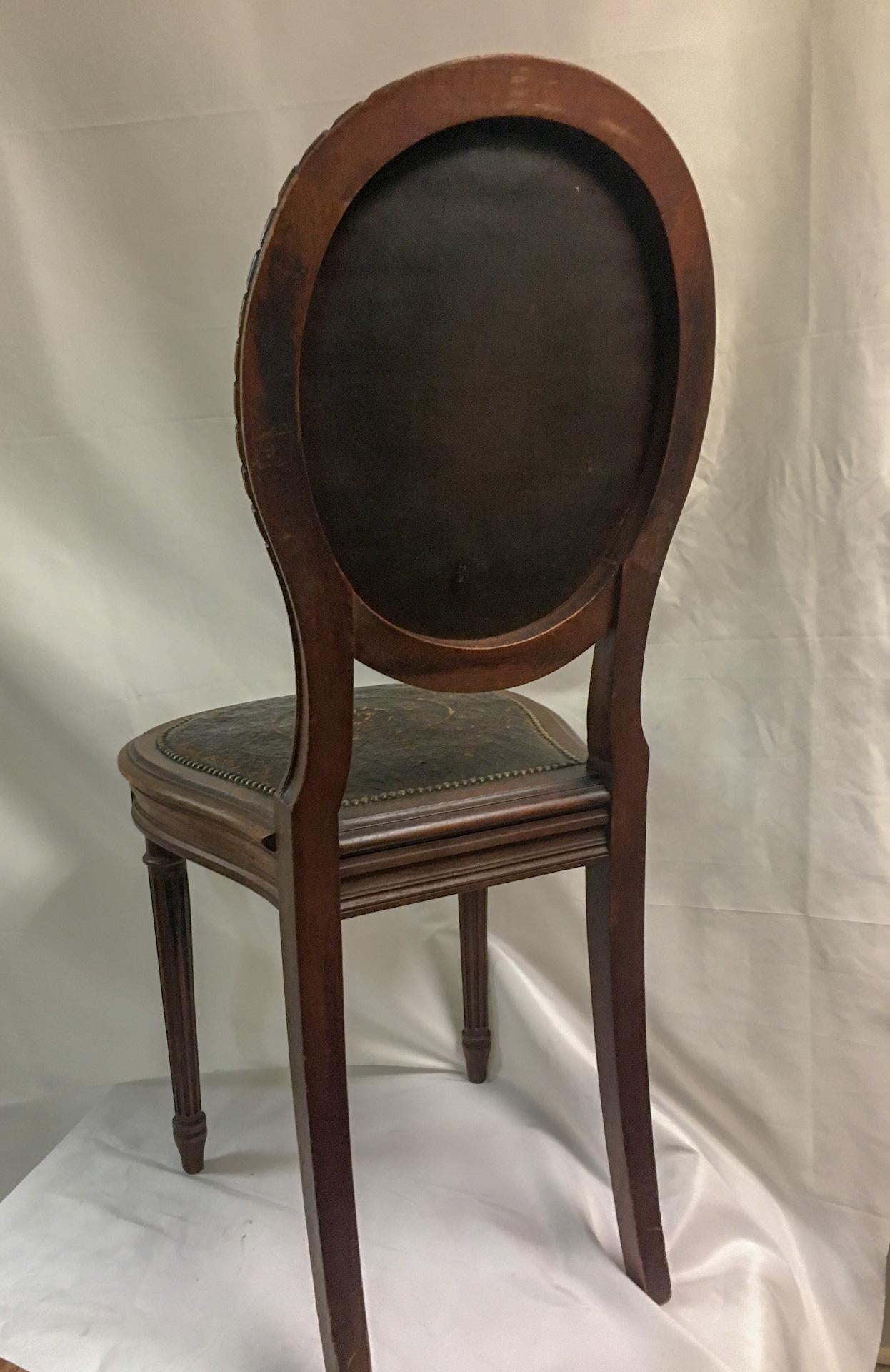 French Napoleon III Set of Four Oak Embossed Leather Covered Chairs w/ Brass Tacks For Sale