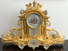 Napoleon III Porcelain Mounted Gilt Bronze Baroque Mantel Clock, circa 1870