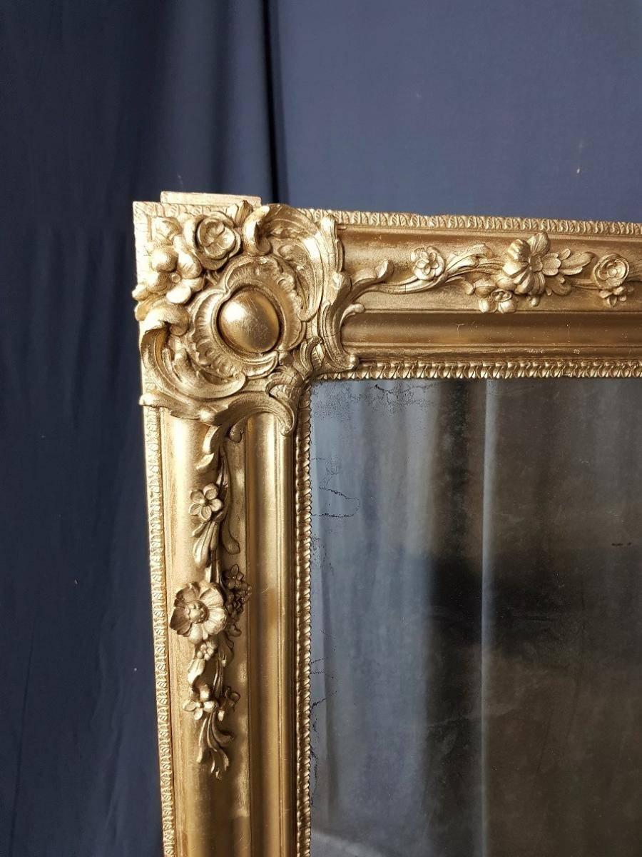 Big size Napoleon III in original mercury mirror and giltwood and gilt stucco with refined ornementations.