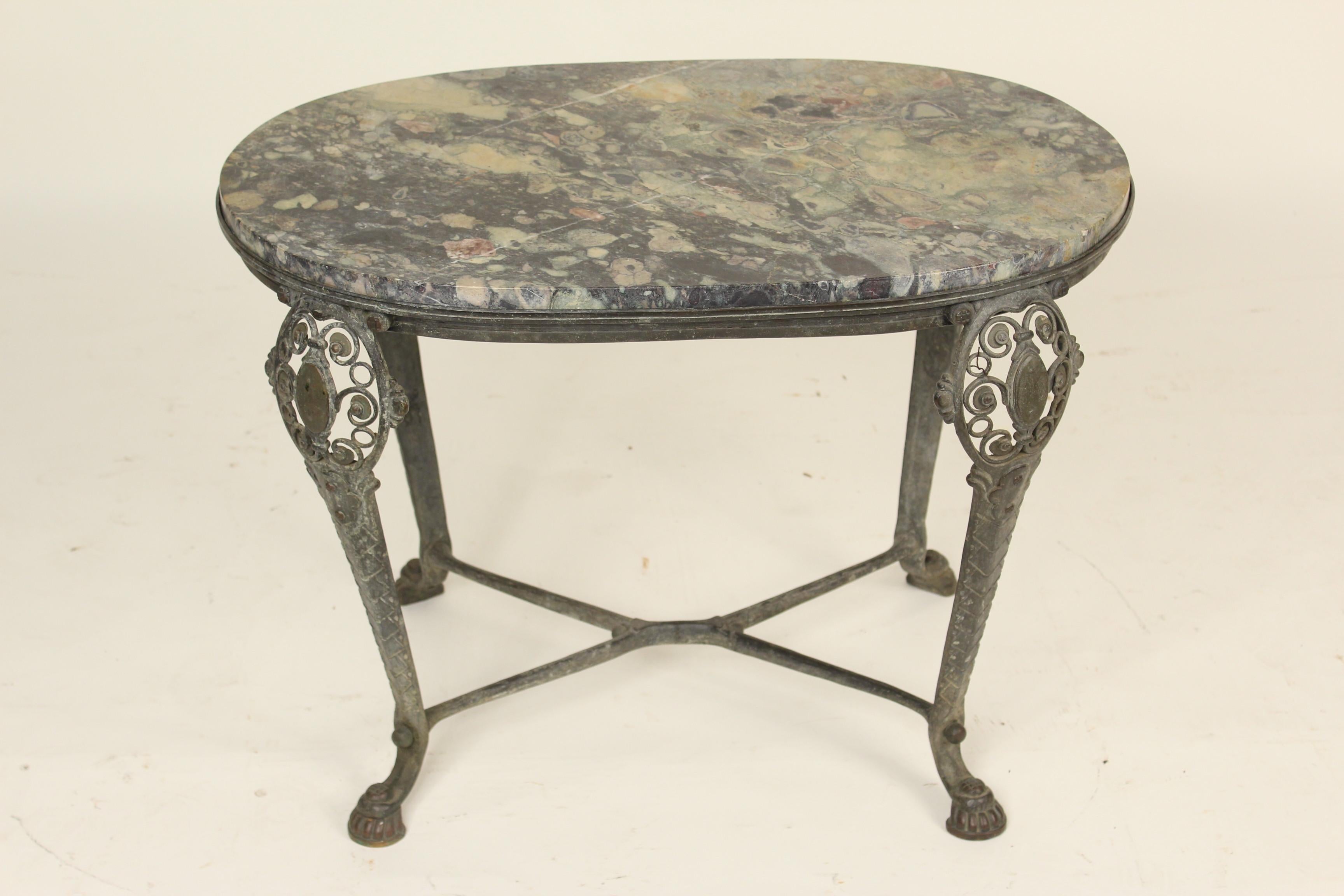 Napoleon III style bronze side table with a marble top circa 1930-1950. This decorative side table could be used either outdoors or indoors.