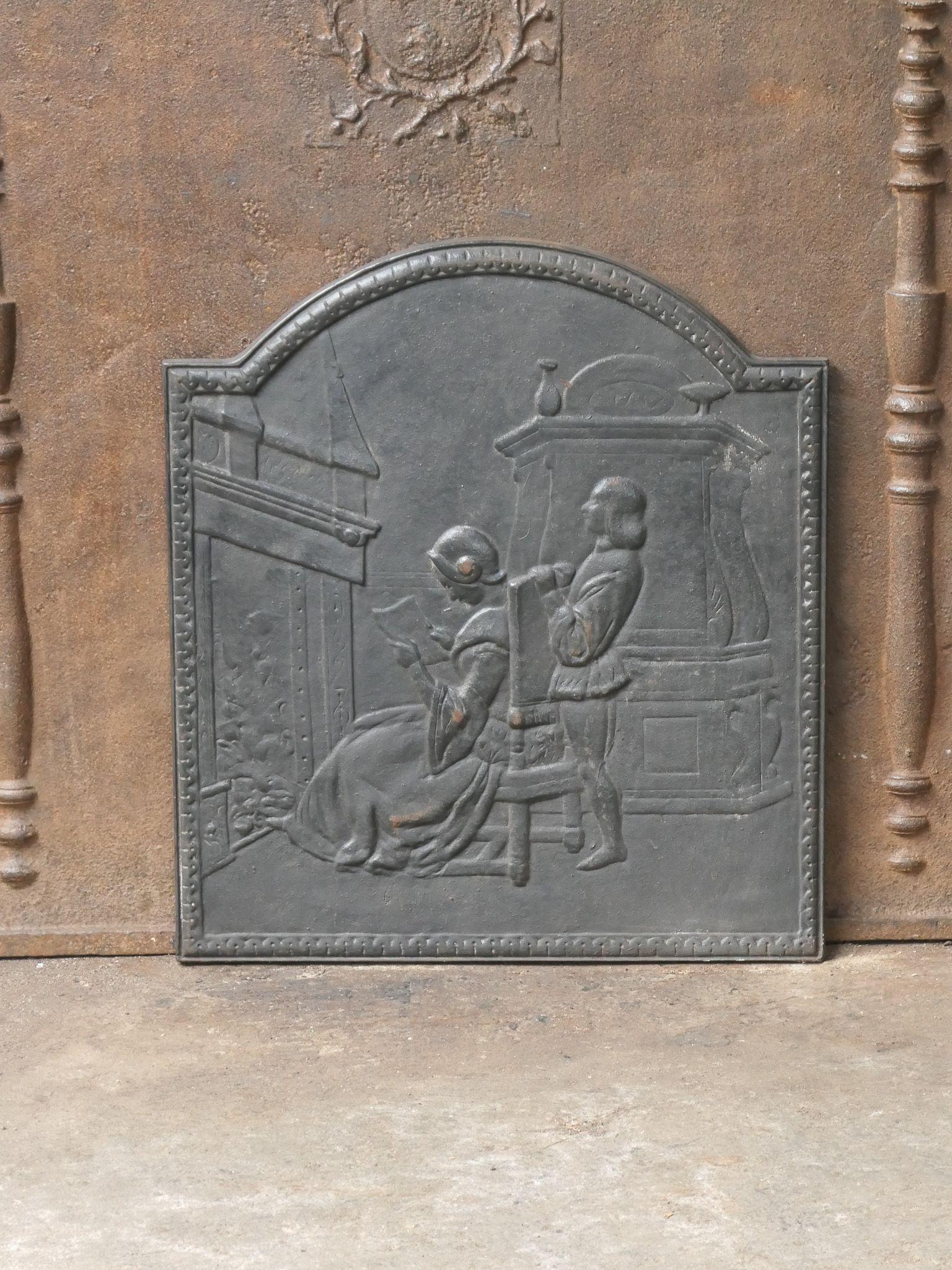 20th century Napoleon III style fireback with a woman reading in front of the fireplace.

The fireback is made of cast iron. It is in a good condition and does not have cracks.

The fireback has a natural brown patina. Upon request it can be made