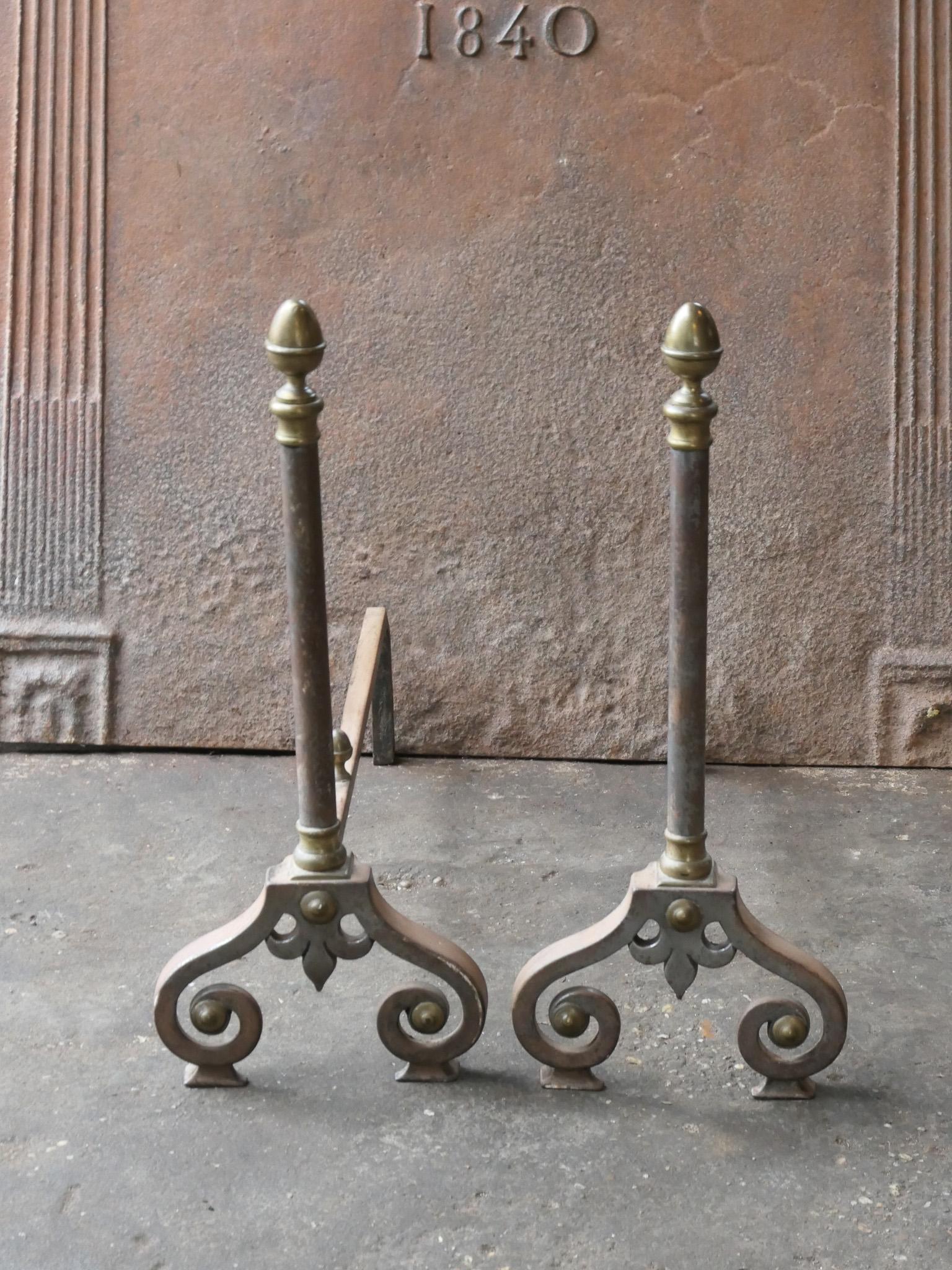 19th - 20th century French Napoleon III style andirons. The andirons are made of brass and wrought iron and are in a good condition.

