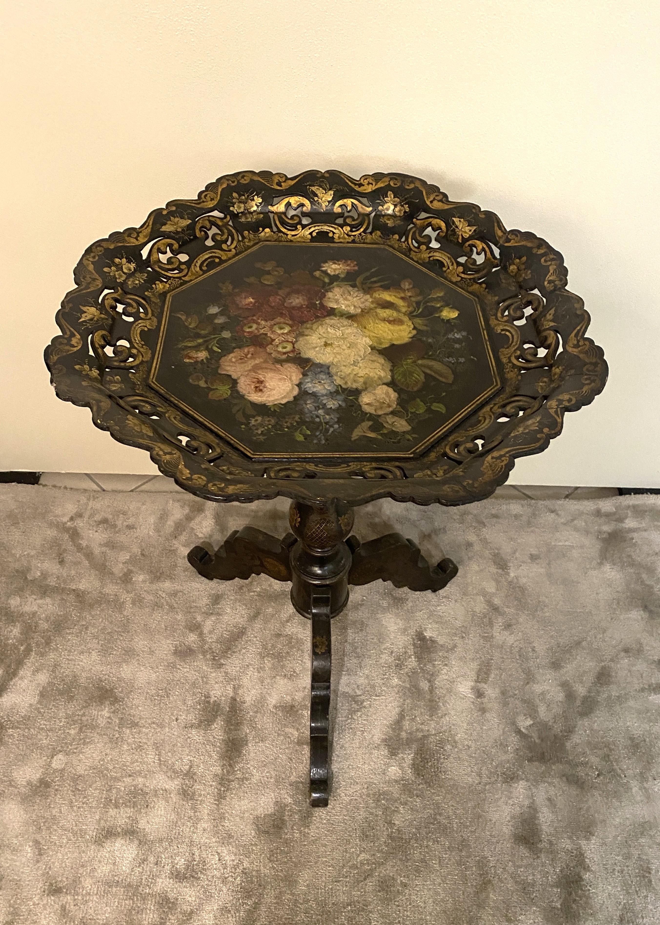Beautiful french sailing table in Papier Machè.The upper part is formed by an octagonal top, made in papier machè, on which has been admirably hand painted a detailed and colorful floral composition. At top has been added a wonderful perforated
