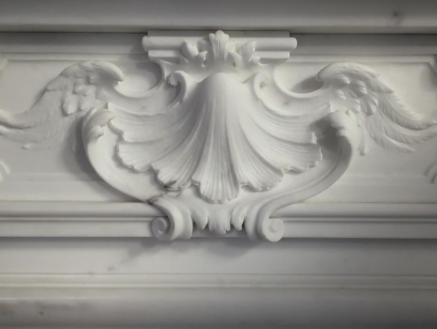 Hand-Carved Napoleon III-Style Mantelpiece in Statuario Carrara Marble Including a Clock For Sale