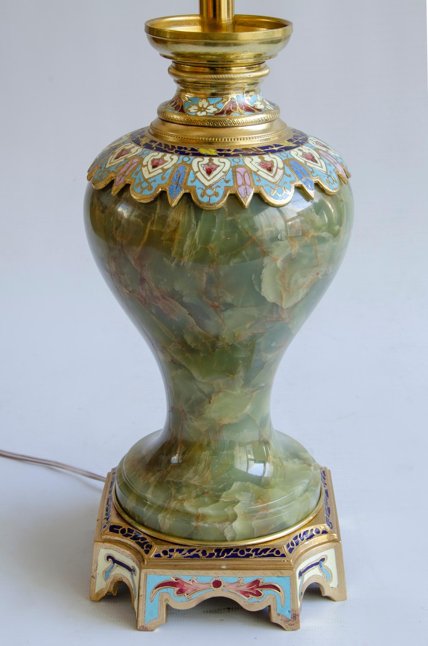 Napoleon III table lamp
materials gilt bronze, onyx and cloisone enamel
Origin France circa 1860
electrified 220 w perfect condition.
The Napoleon III style had its heyday during the 1850s and 1880s. Emperor Napoleon wanted to emulate the lavishness