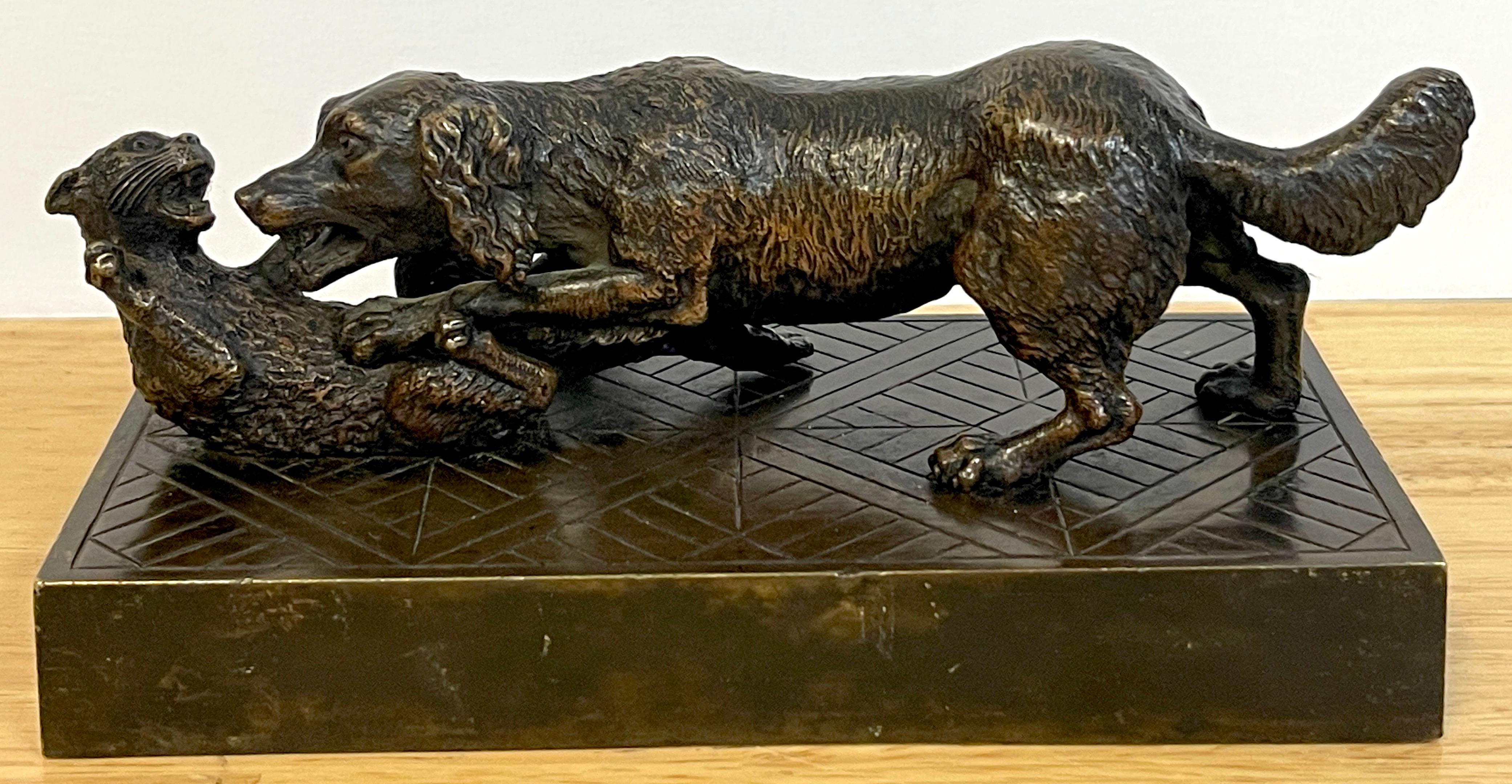 Napoleon III whimsical bronze of a playful dog & cat, Nice detail, fine casting of a dog and cat engaged in play on incised brick floor, unsigned. 



