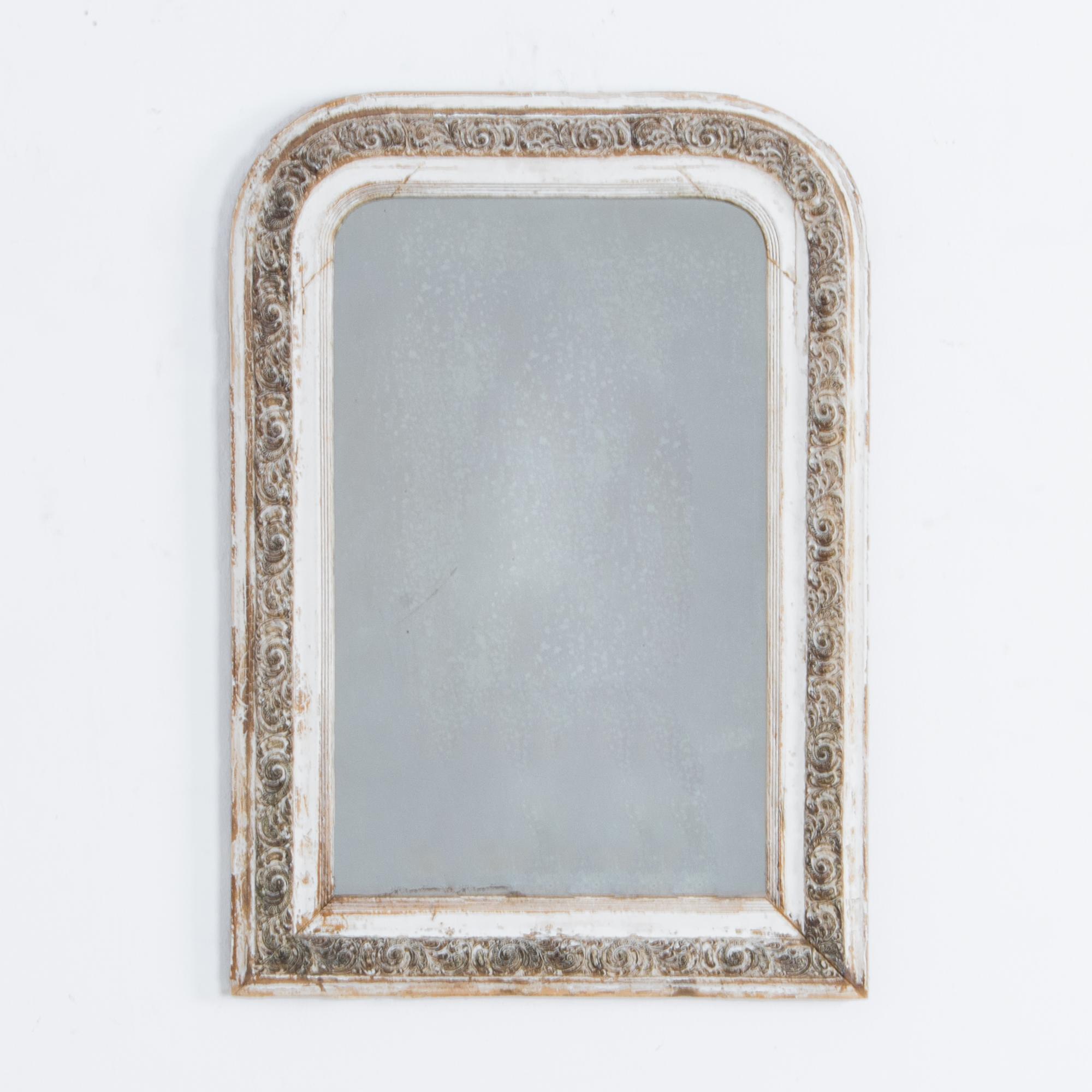 Contrasting the usual opulence of the Second Empire style, this simple white frame, subtly ornamented with a leaf patterned frieze, charms in spaces simple or ornate. From France, circa 1880. Finely crafted with traditional techniques from European
