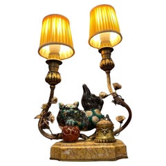 Napoleon IlI period inkwell lamp decorated with a porcelain Fô dog, 19th century