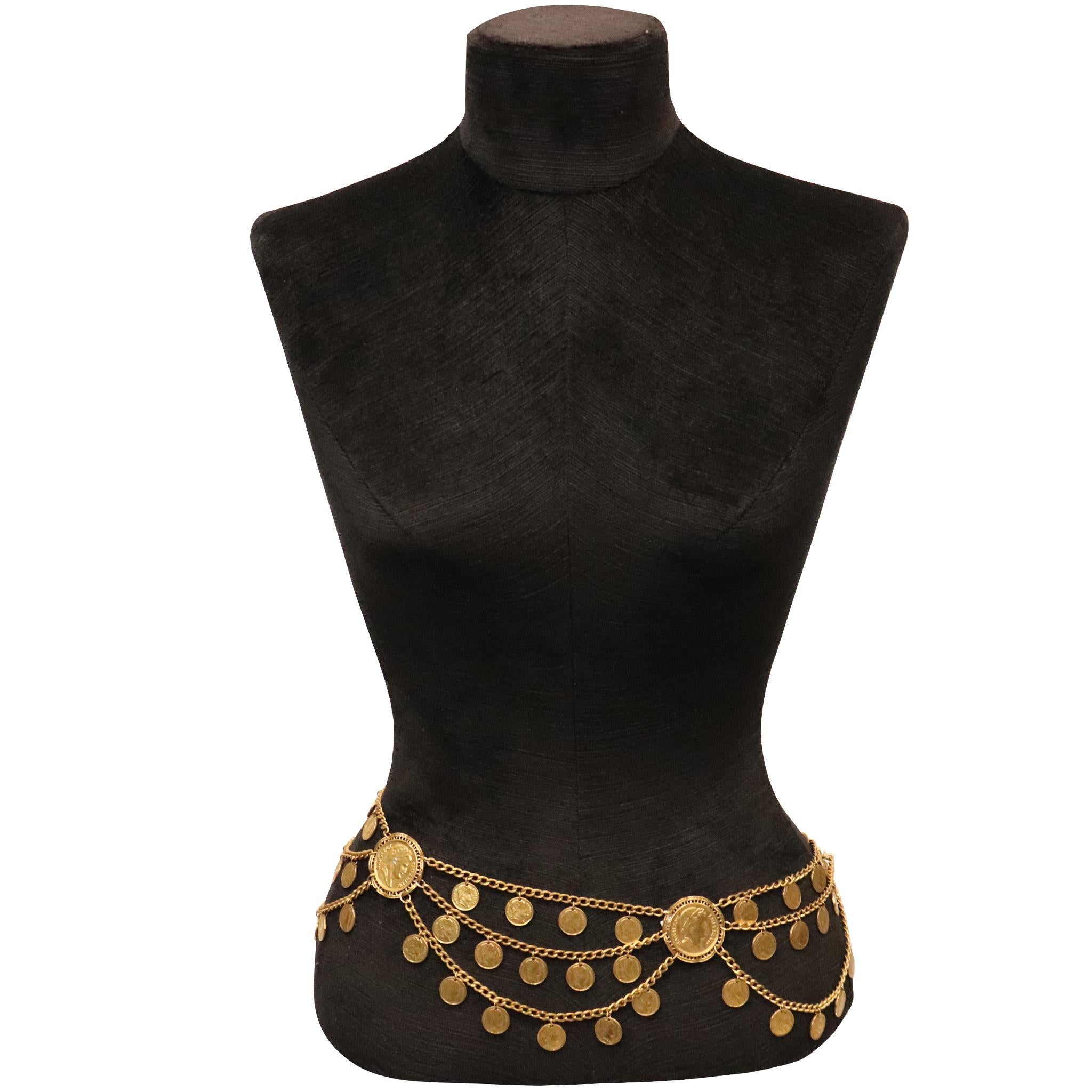 Napoleon motif High Polished BRASS Coin Chain Belt. 
This belt is a highly polished brass coin belt, with a finish similar to that of fine gold 
The belt is in excellent condition as if unused. 

Measurements: 

Longest length - 37 inches
Shortest