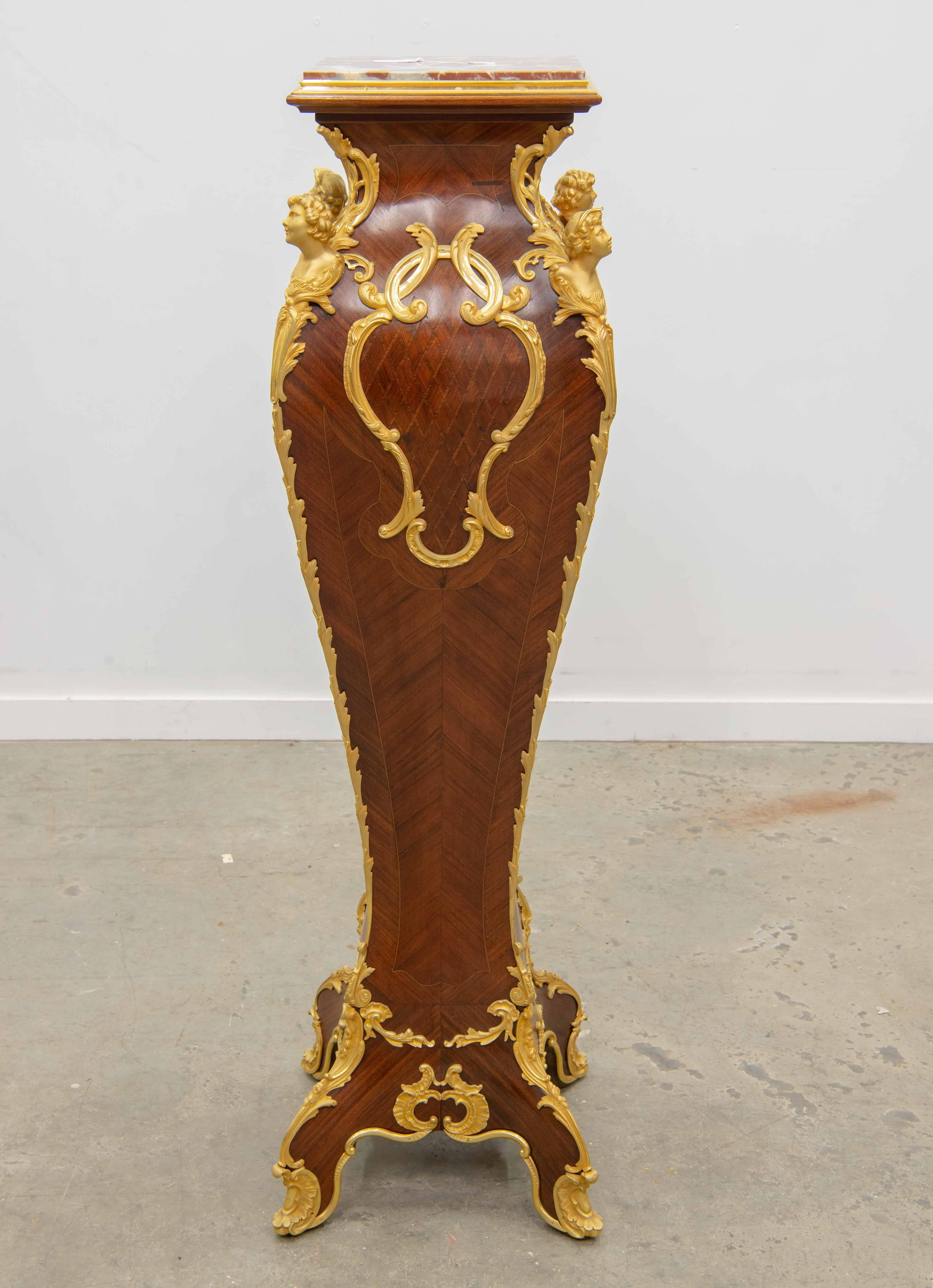Fine and very nice Napoleon three style pedestal with marble top.
The pedestal is made of kingswood with marquetry inlay. It is also bronze-mounted with ormolu bronze figures and ornaments.
Overall condition is super. The gold is clean, the
