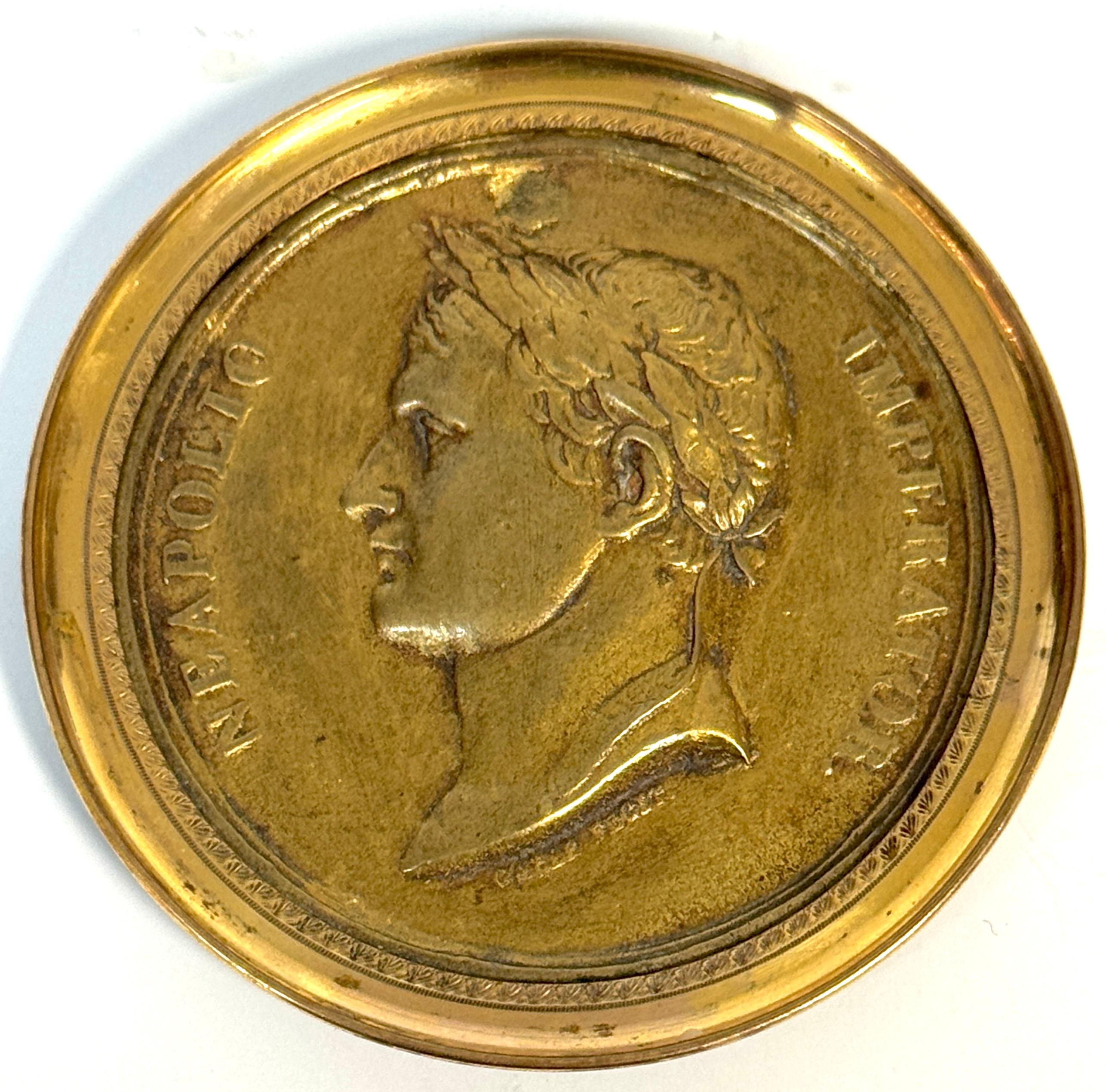 Napoleonic Gilt-Bronze Portrait Medallion of Napoleon, Signed Carlier Fecit, France, circa 1804–1806

An Empire-period gilt-bronze portrait medallion of Napoleon Bonaparte (1769–1821), the obverse finely modeled with his left-facing laureate profile