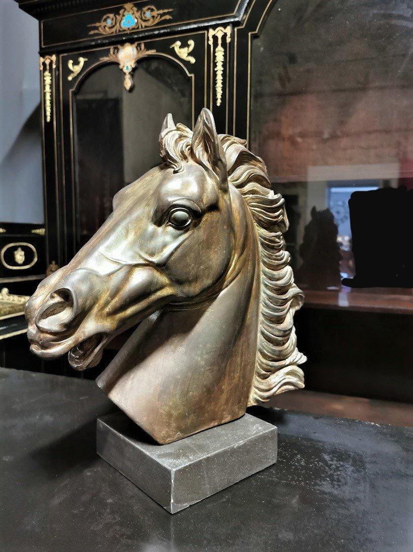Tall dimension, beautiful, elegant and expressive sculpture representing Napoleon's horse, made in patinated plaster with its marble base of 17 cm x 17 cm. Empire style, France 19th century.