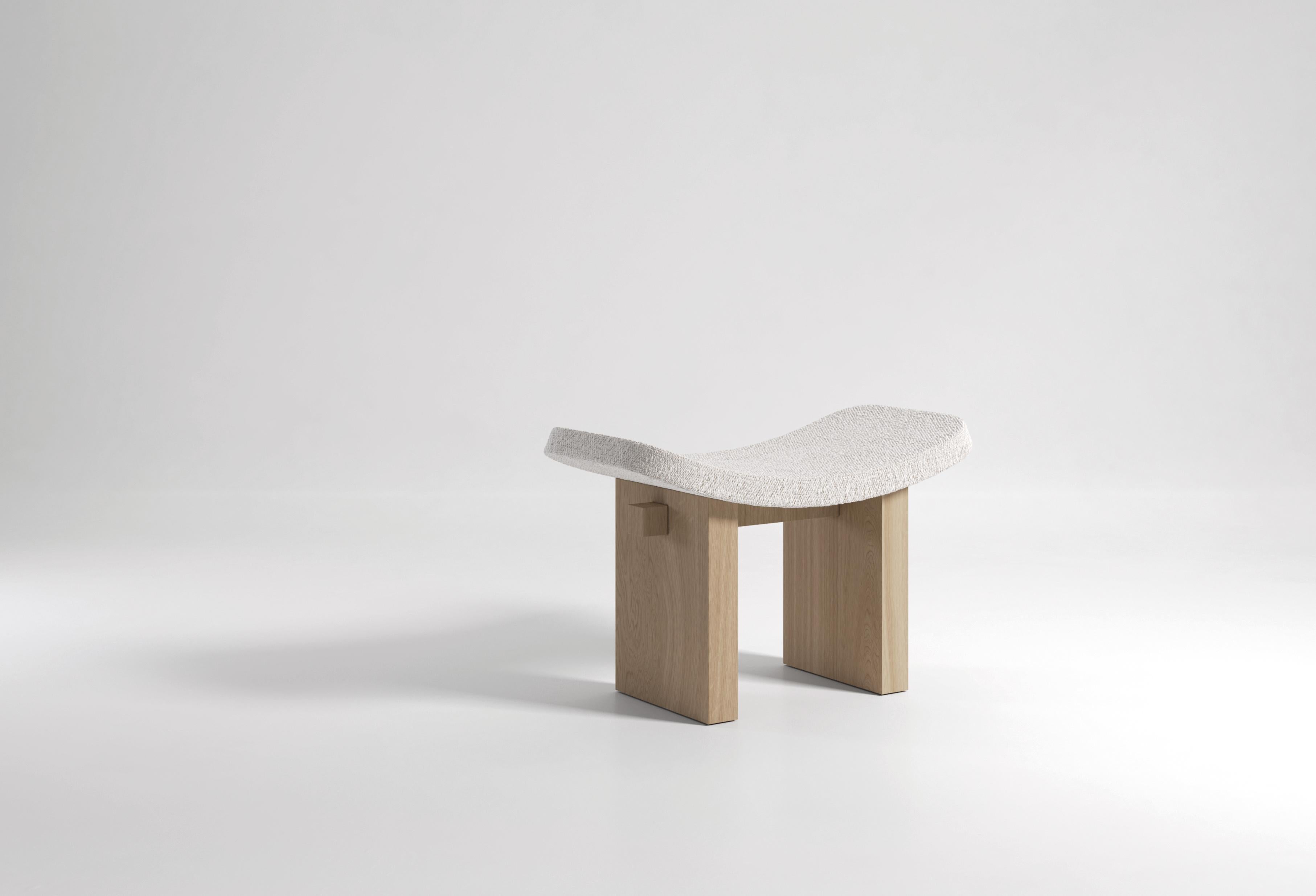 The Nara stool is a minimal one-seater stool with references to ancient Japanese architecture and forms. Nara is the perfect piece to sit in the corner of a room until needed, her combination of strong straight lines and soft, curved upholstery give