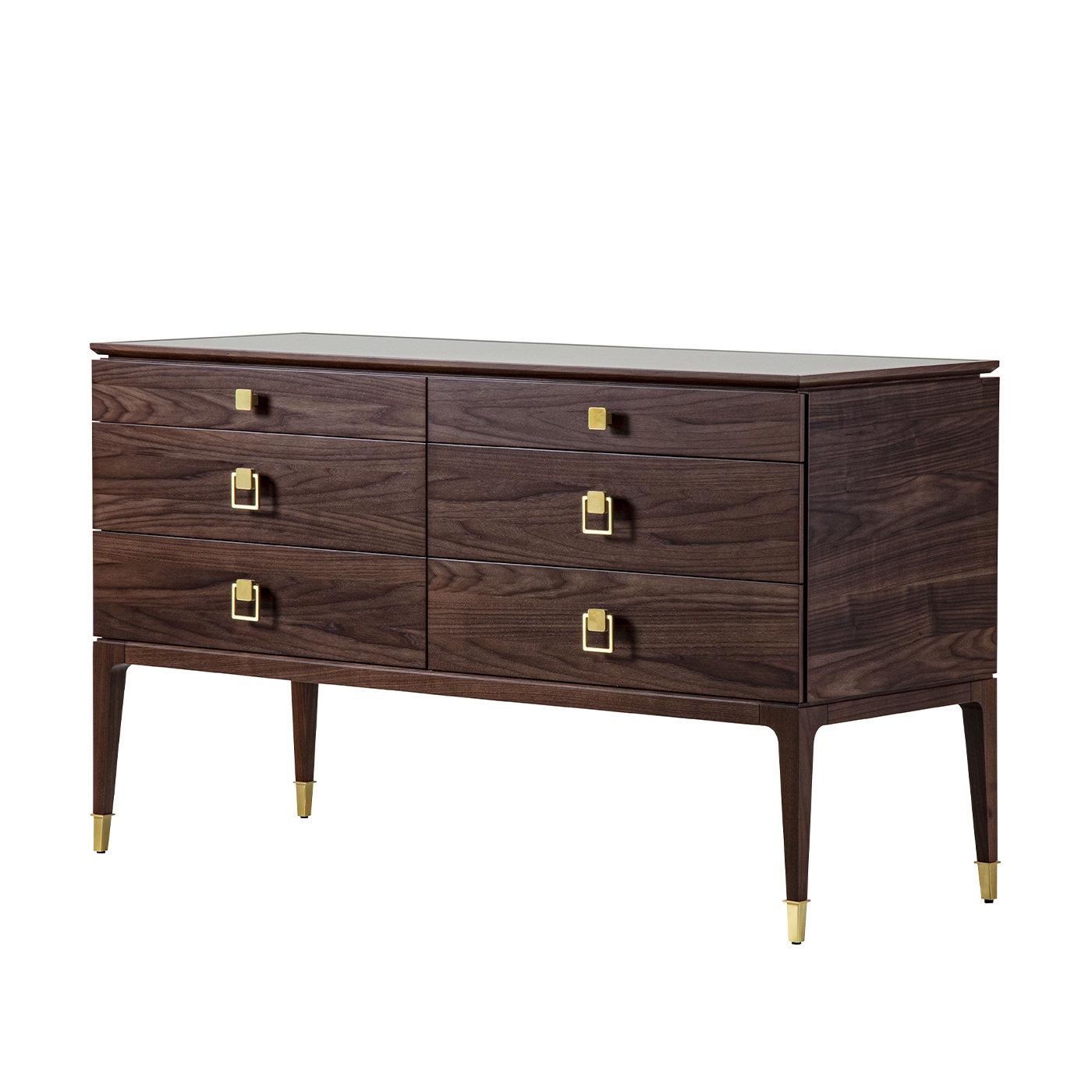 This walnut dresser finished in matt tobacco is named after the Japanese city of Nara, from which borrows a subdued architectural flair combined with Art Deco style suggestions. The storage unit comprising six drawers is raised on tapered legs