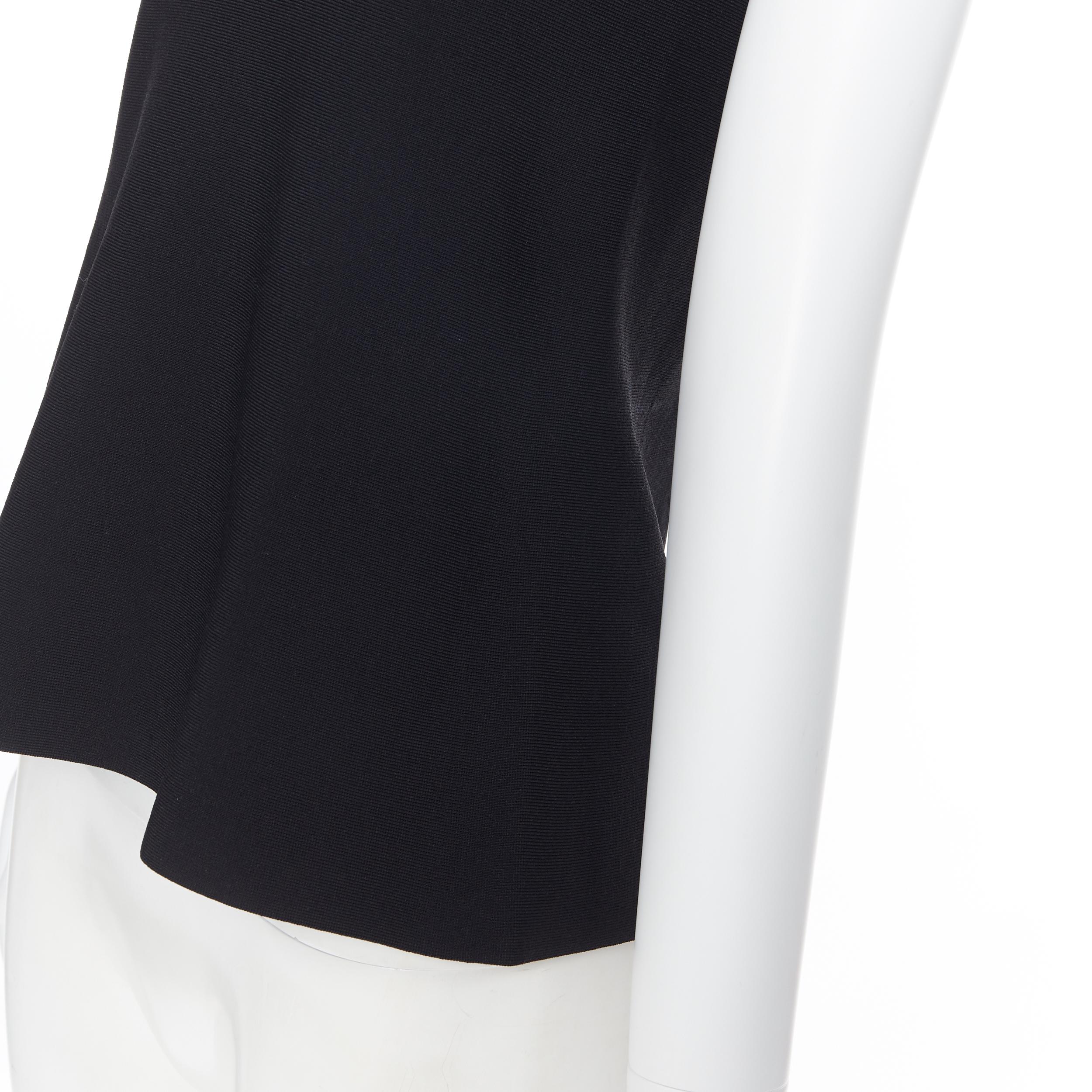 NARCISO RODRIGUEZ black viscose knit stretchy sleeveless top IT38
Brand: Narciso Rodriguez
Designer: Narciso Rodriguez
Model Name / Style: Stretch top
Material: Viscose blend
Color: Black
Pattern: Solid
Extra Detail: Stretch fit.  Sleeveless. Round