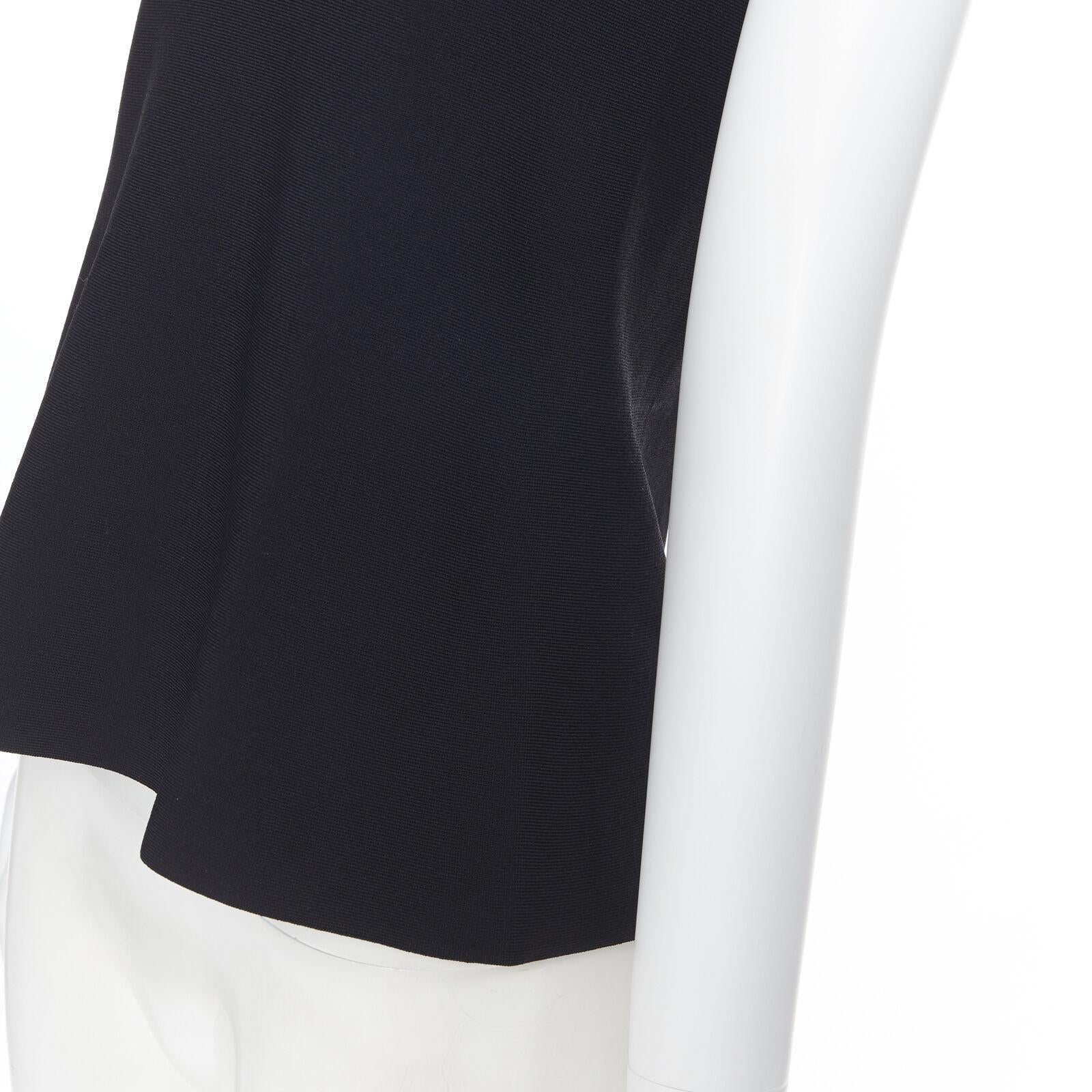 NARCISO RODRIGUEZ black viscose knit stretchy sleeveless top IT38
Reference: SNKO/A00051
Brand: Narciso Rodriguez
Material: Viscose, Blend
Color: Black
Pattern: Solid
Extra Details: Stretch fit.
Made in: China

CONDITION:
Condition: Excellent, this