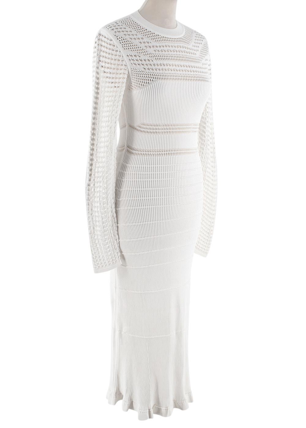 Narciso Rodriguez Paneled ribbed-knit midi dress

- Semi-sheer crocheted panels
- gently fluted hem
- Round neckline 
- Elasticated fabric 

Materials 
86% viscose, 14% polyester

Dry Clean Only

Made in China 

Measurements are taken laying flat,