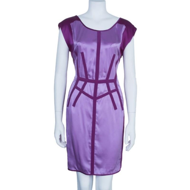Go back to the future in this Narciso Rodriguez piece. Made from purple satin, it is contrasted with dark purple outline on the half sleeves and geometric lines at the waist accentuating your curves. This dress has a knee-length hem.

Includes: