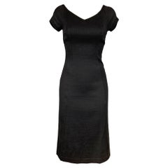 NARCISO RODRIGUEZ Taglia 2 Vestito nero a coste in cotone e poliammide con scollo a V