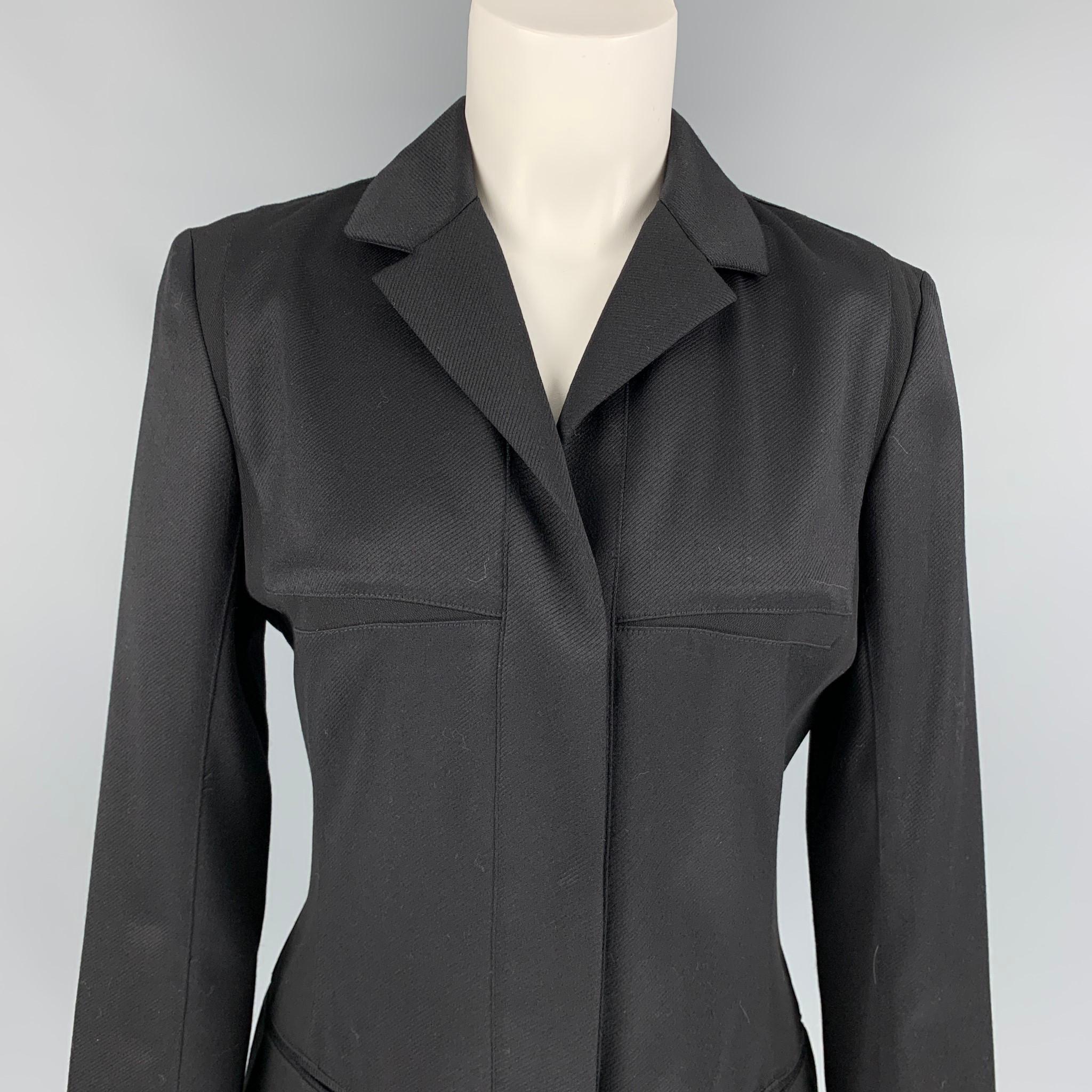 NARCISO RODRIGUEZ jacket comes in a black textured virgin wool / silk featuring a notch lapel, slit pockets, and a zip & snap button closure. 

Very Good Pre-Owned Condition.
Marked: I 42 / F 38 / D 38 / GB 10 / US 6

Measurements:

Shoulder: 15.5