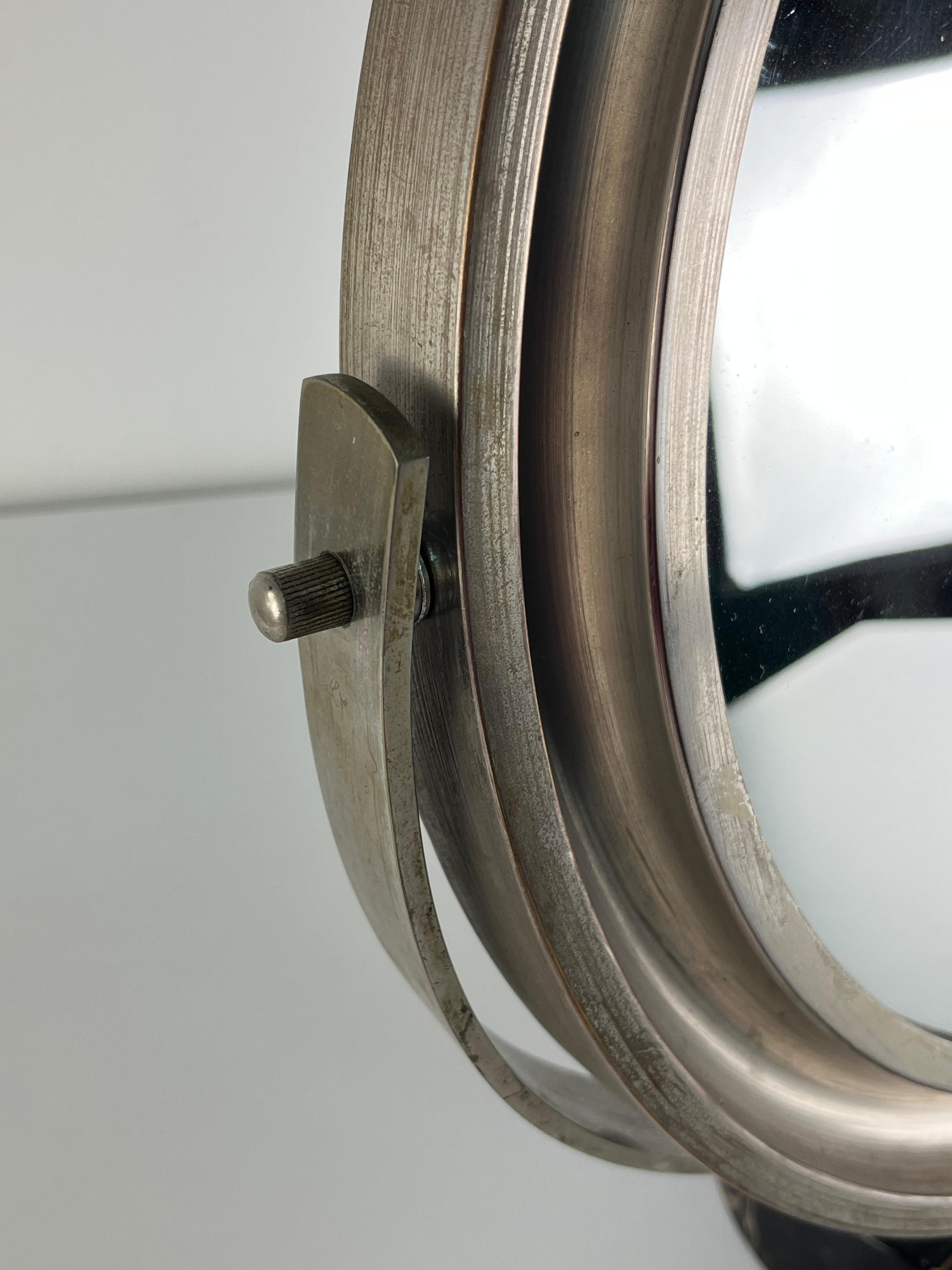 Narciso tilting table mirror by Sergio Mazza for Artemide, 1960s.
Good condition, shows small signs of aging.