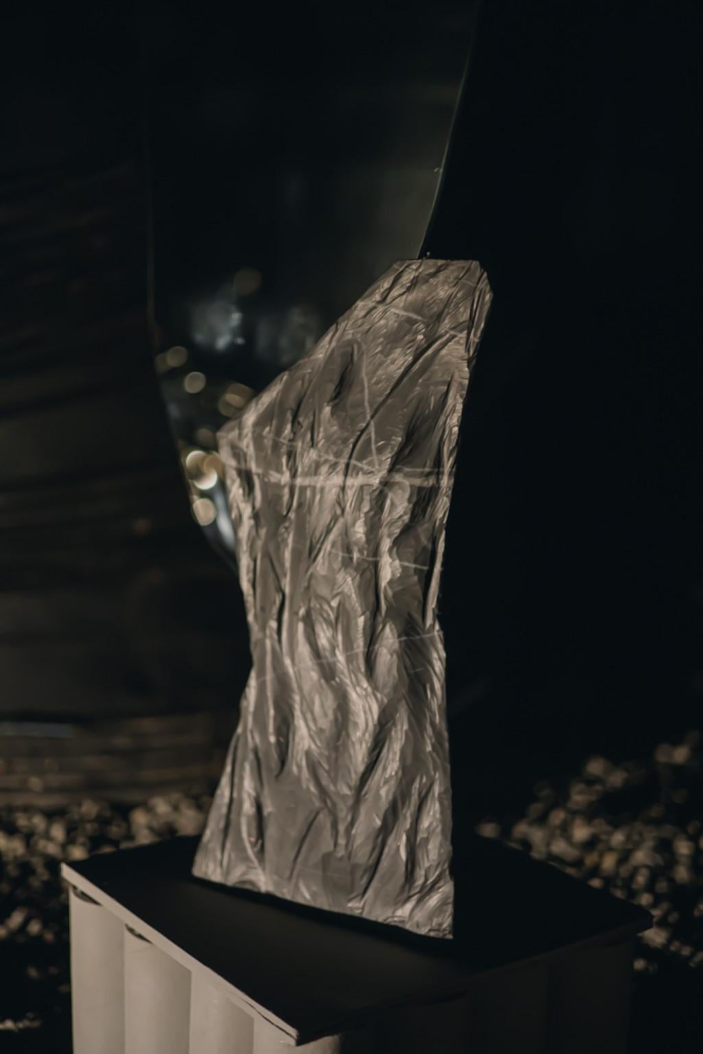 Narciso Tres Mirror by Andres Monnier
Dimensions: W 35 x D 60 x H 180 cm
Materials: Black marble, mirror.

This piece is a variant of the original design and third piece of the collection. The shape of the mirror represents the body of water where