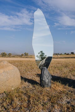 Organic Shape Mirror with Grey Stone Base in Center by Andres Monnier