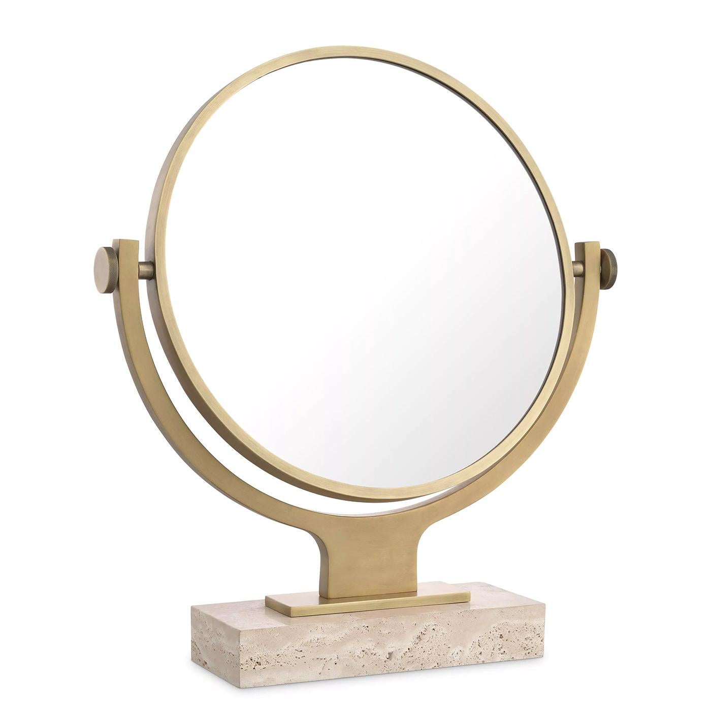Mirror Narcisse with carved travertine base and
structure in brass and iron in antique finish. With
removable round mirror glass.