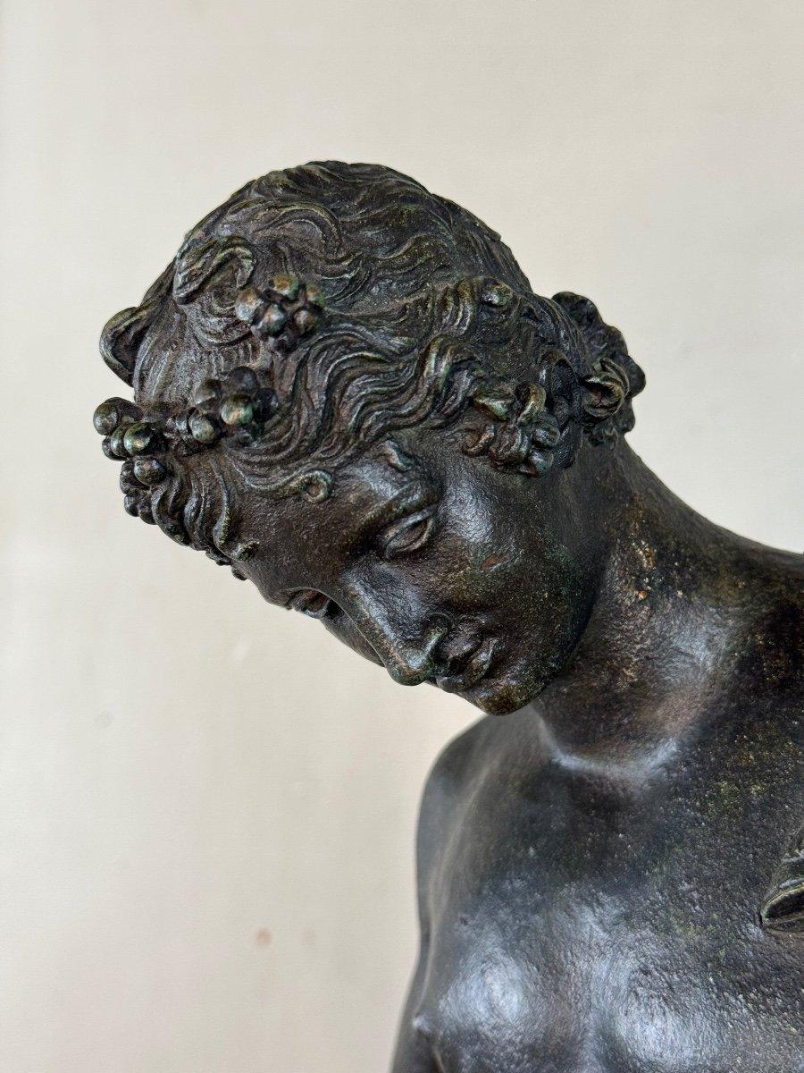 Narcissus, bronze with black patina, based on the antique, signature on the base Michele Amodio Napoli, 19th century.

After the original statue from antiquity discovered in Pompeii in 1862, the original is now in the National Achaeological Museum