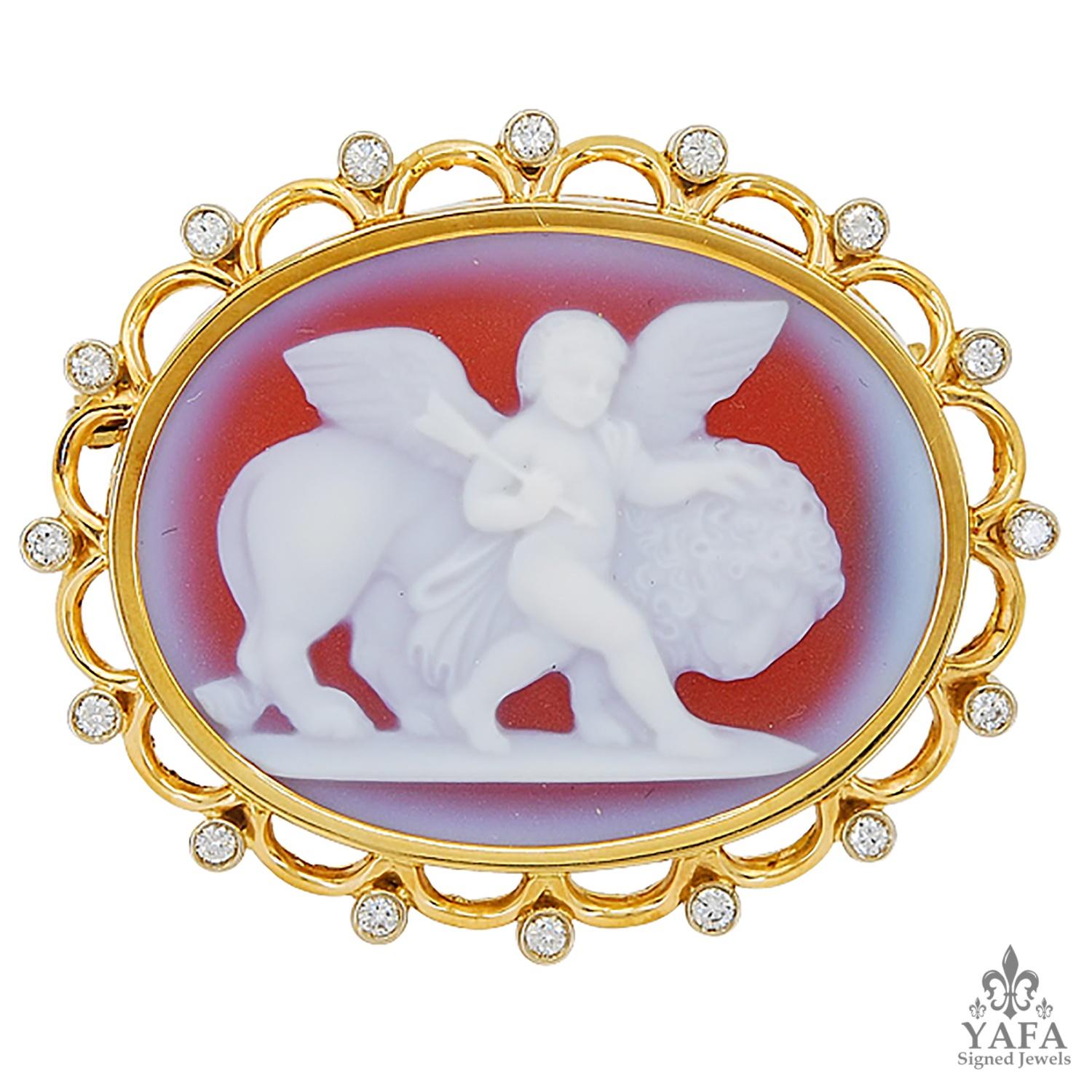 An Italian two-toned cameo brooch by Nardi featuring a gold scalloped halo, finished with meticulously-spaced round diamonds that frame the outer edge. Although this cameo dates from the 1980s, it is a nod to Victorian brooches which often paid