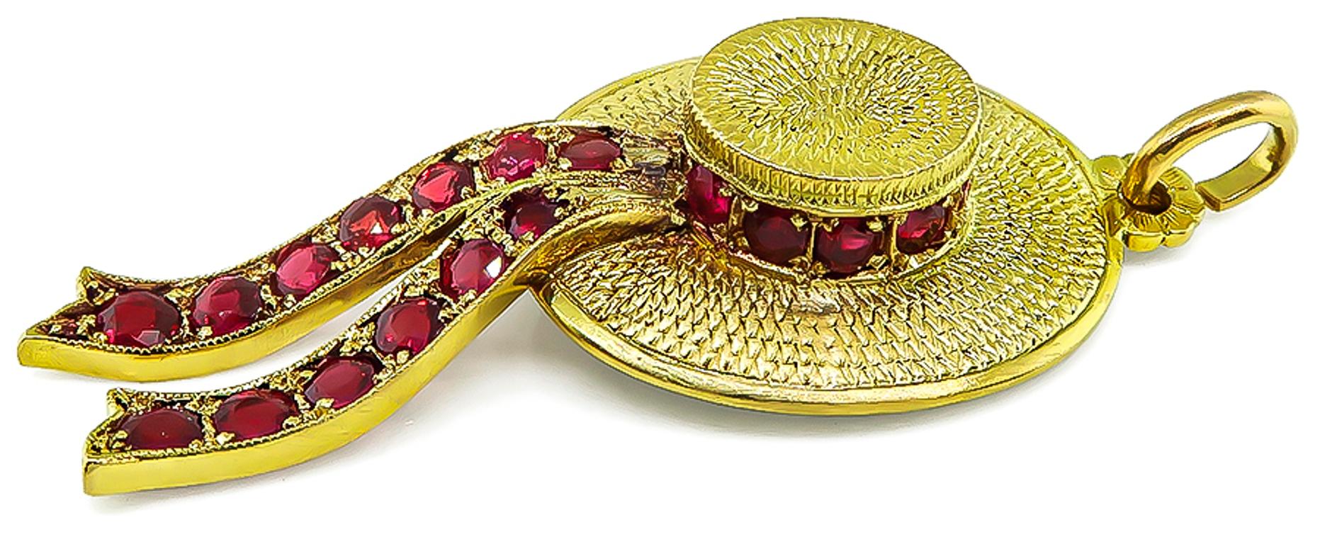 This elegant 18k yellow gold hat pendant by Nardi is set with lovely round cut rubies that weigh approximately 3.00ct. The pendant measures 53mm by 21mm and weighs 8.5 grams. It is signed NARDI 750.


Inventory #27881RBS