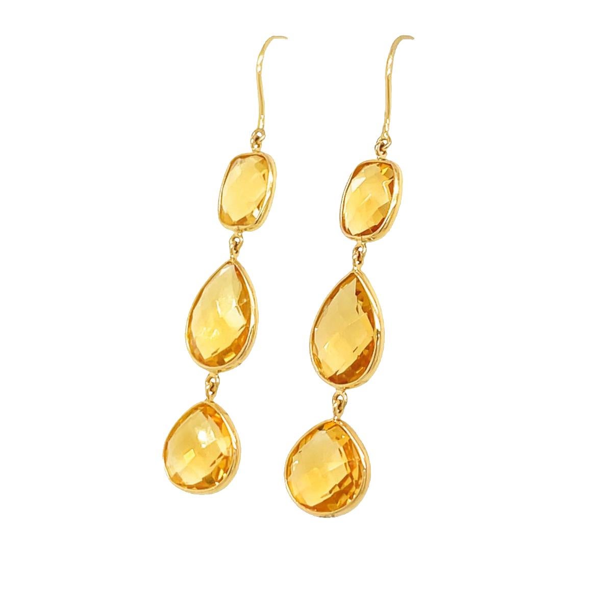 Gorgeous dangle earrings with three drops of checker-cut Citrine. The different shapes of the gemstones make this pair unique and so pretty. Cast in 18K yellow gold, these elegant and gorgeous pair features 13.40 ct. t.w. checkerboard pear-shaped