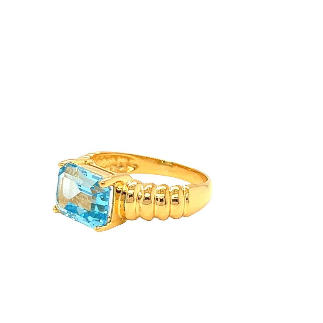 Contemporary Nari Fine Jewels Emerald Cut Blue Topaz Fluted Dome Ring 14K Yellow Gold For Sale