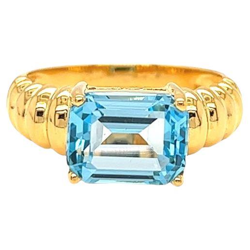 Nari Fine Jewels Emerald Cut Blue Topaz Fluted Dome Ring 14K Yellow Gold For Sale