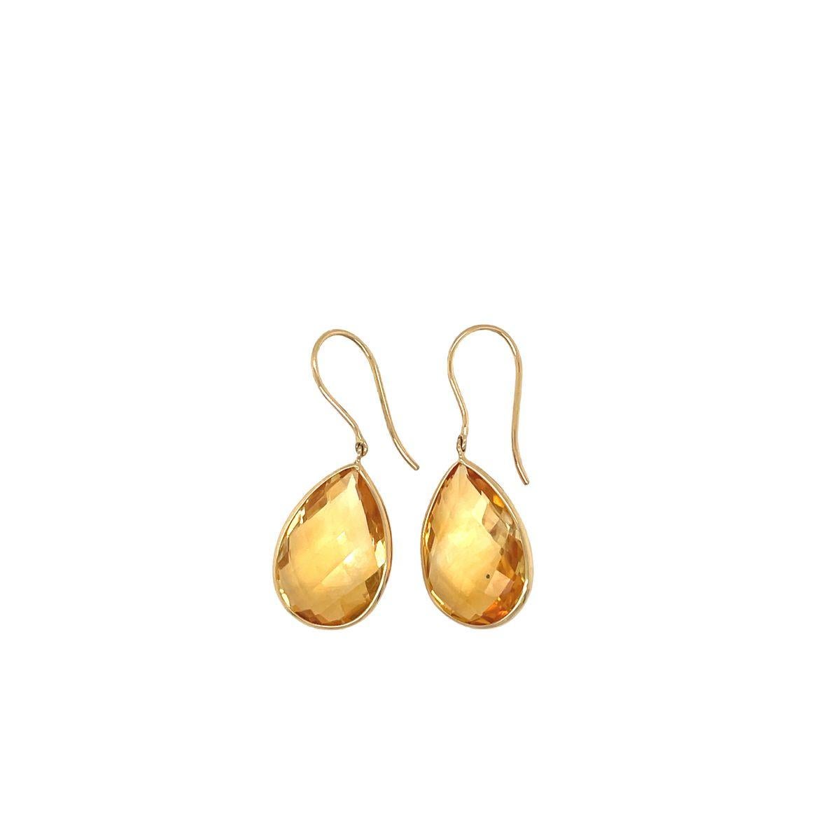 Make a stunning statement with these vibrant drop earrings. Cast in 18K yellow gold, these elegant and gorgeous pair features 13.40 ct. t.w. checkerboard pear-shaped Citrine in simple bezel setting. Each stone is hand cut and hand picked to match