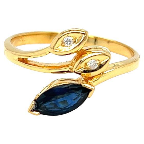 Bypass-Ring aus 14 Karat Gelbgold mit Marquise-Saphir und Diamanten von Nari Fine Jewels 