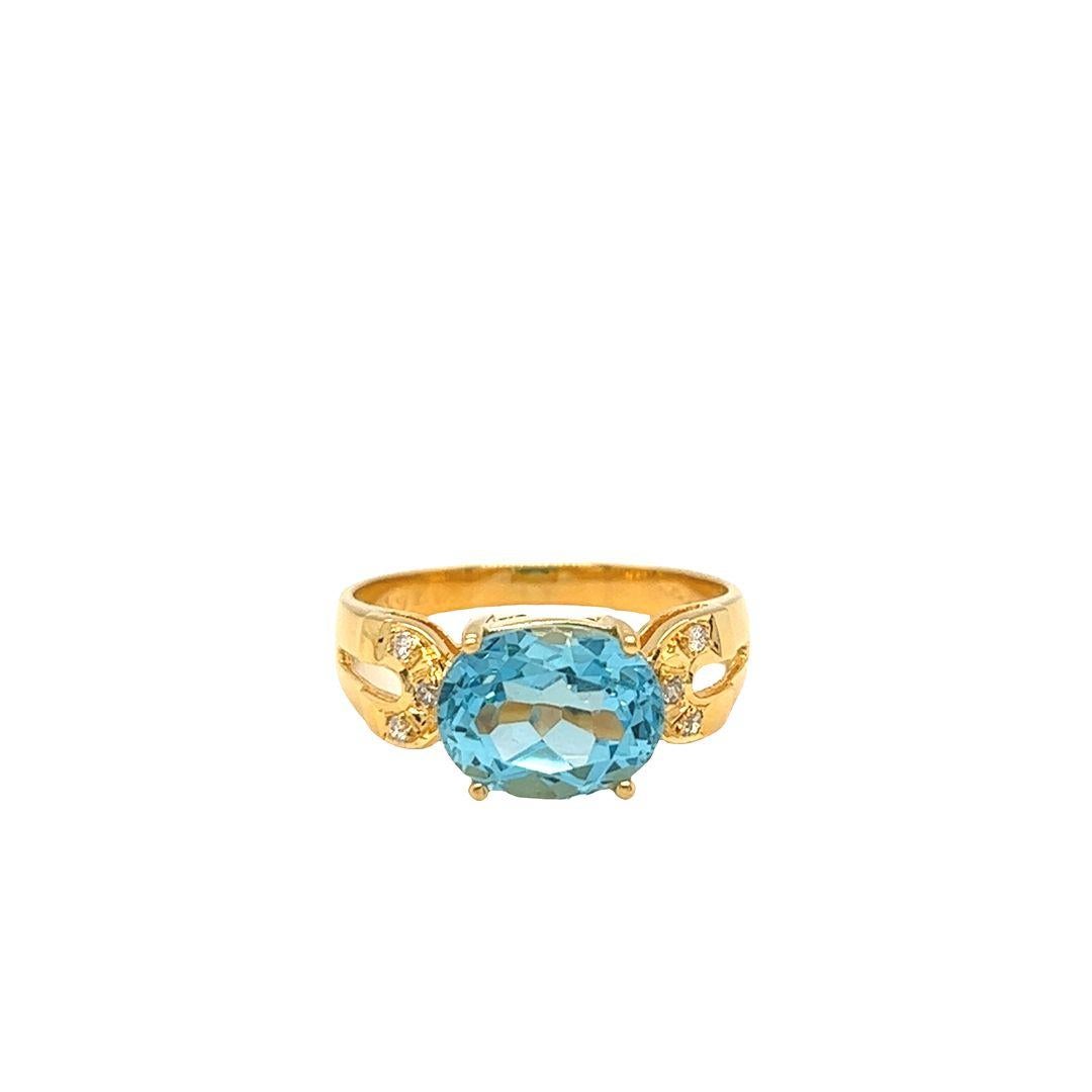 Oval Cut Nari Fine Jewels Oval Blue Topaz and Diamond Ring 14K For Sale