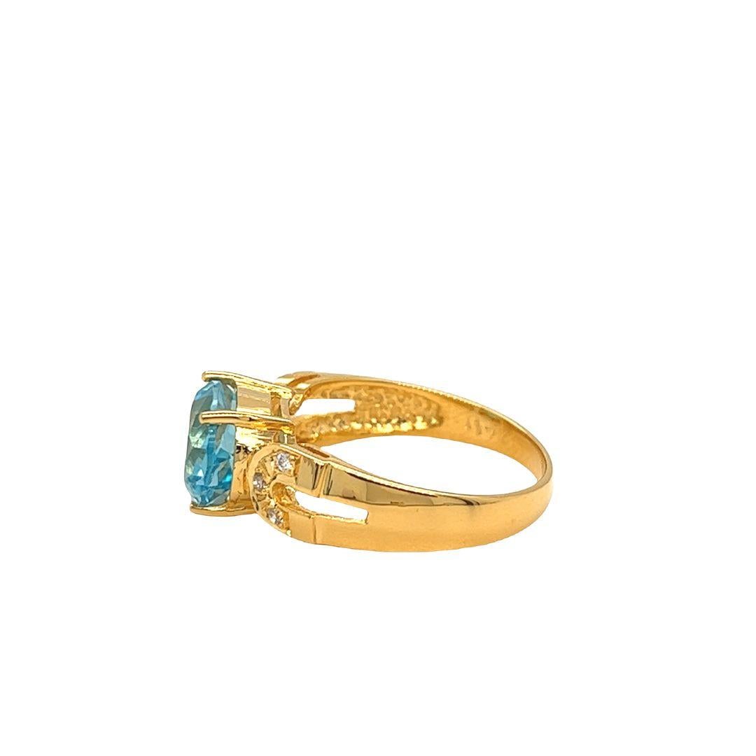 Women's Nari Fine Jewels Oval Blue Topaz and Diamond Ring 14K For Sale