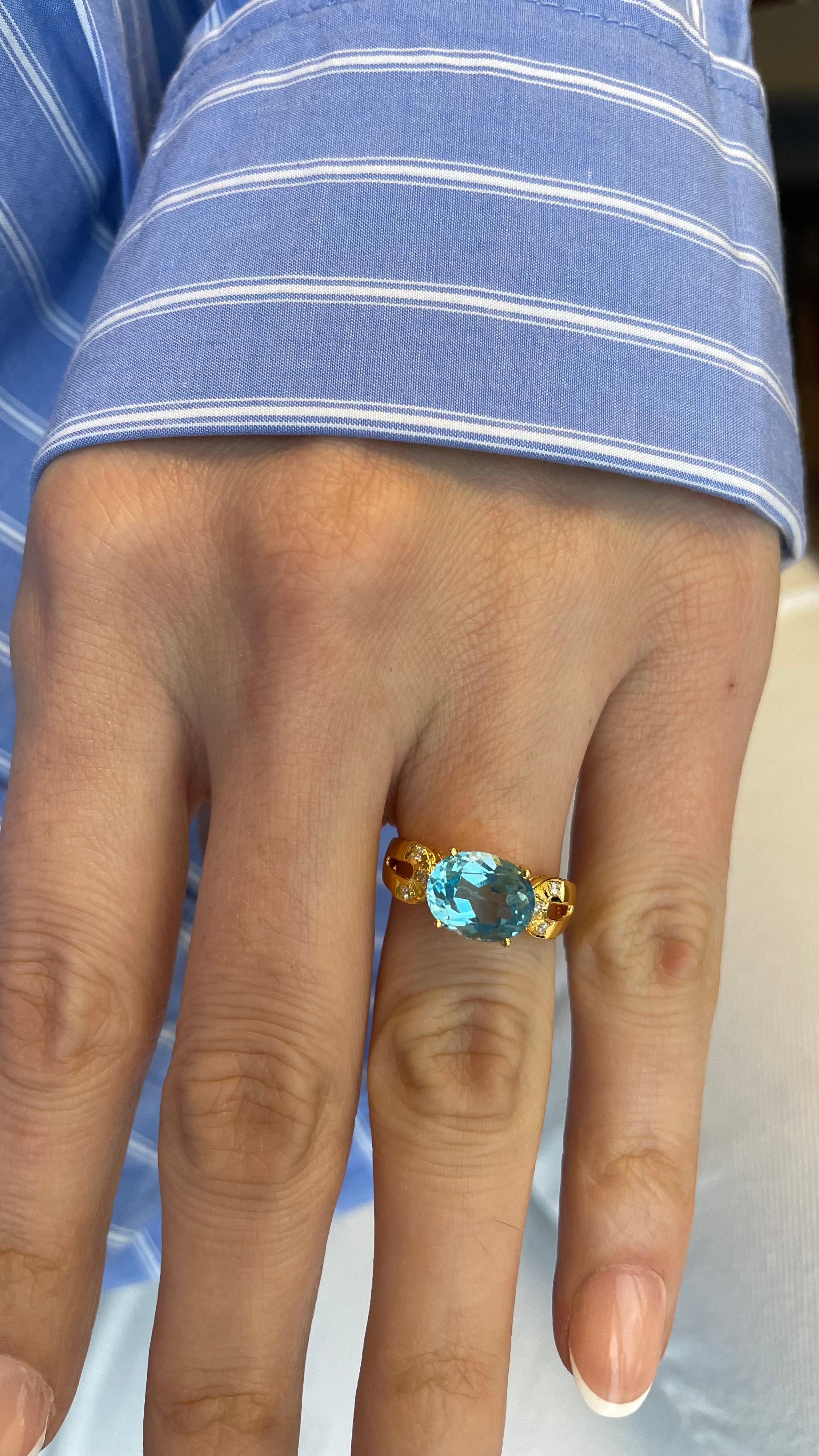 Nari Fine Jewels Oval Blue Topaz and Diamond Ring 14K For Sale 1