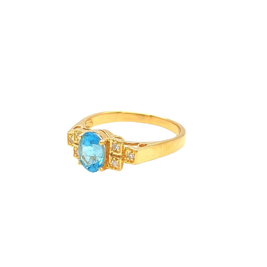 Nari Fine Jewels Oval Blue Topaz and Diamond Ring 14K Yellow Gold In New Condition For Sale In beverly hills, CA