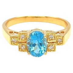 Nari Fine Jewels Oval Blue Topaz and Diamond Ring 14K Yellow Gold