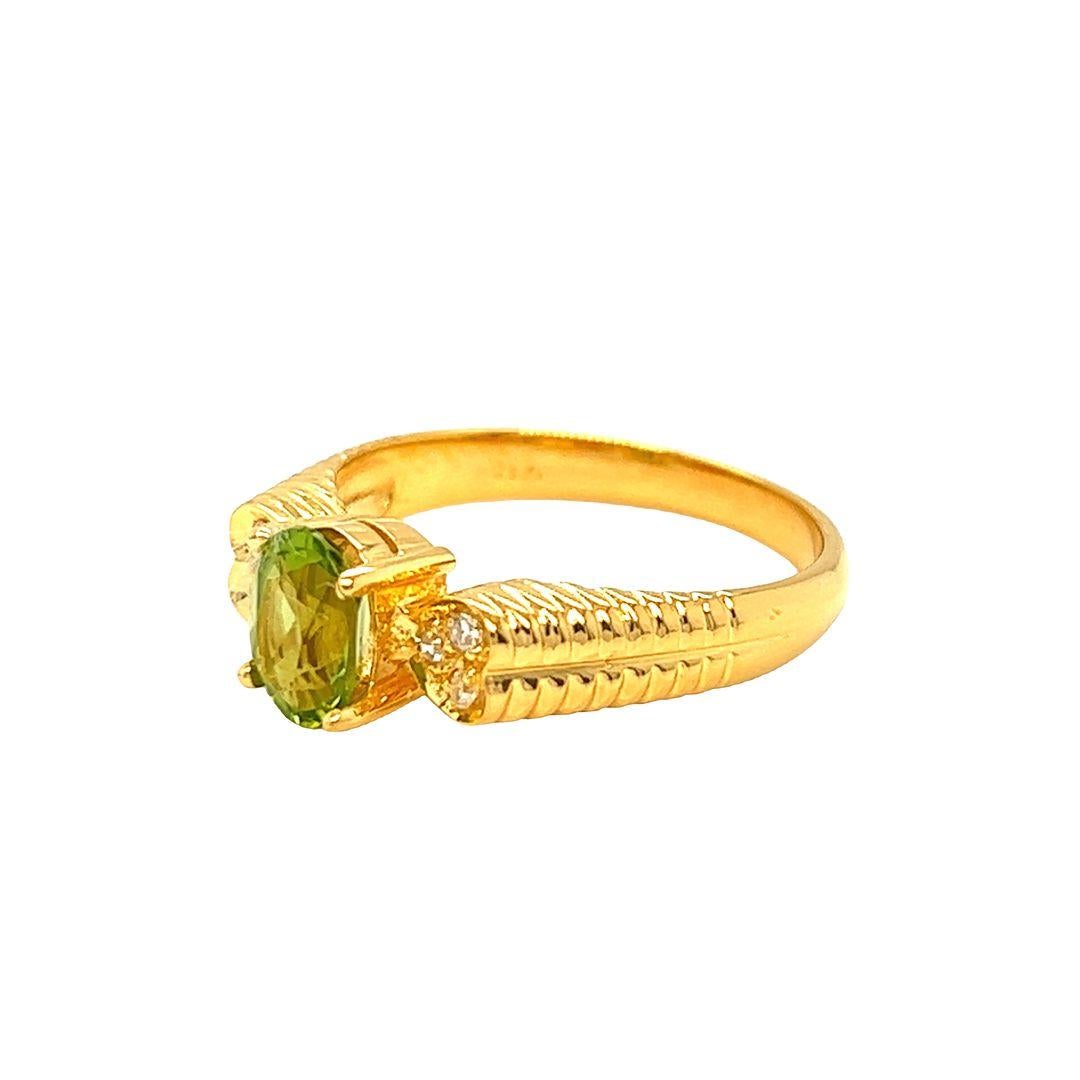 Contemporary Nari Fine Jewels Oval Peridot and Diamond Ring Heart Accent 14K Yellow Gold For Sale
