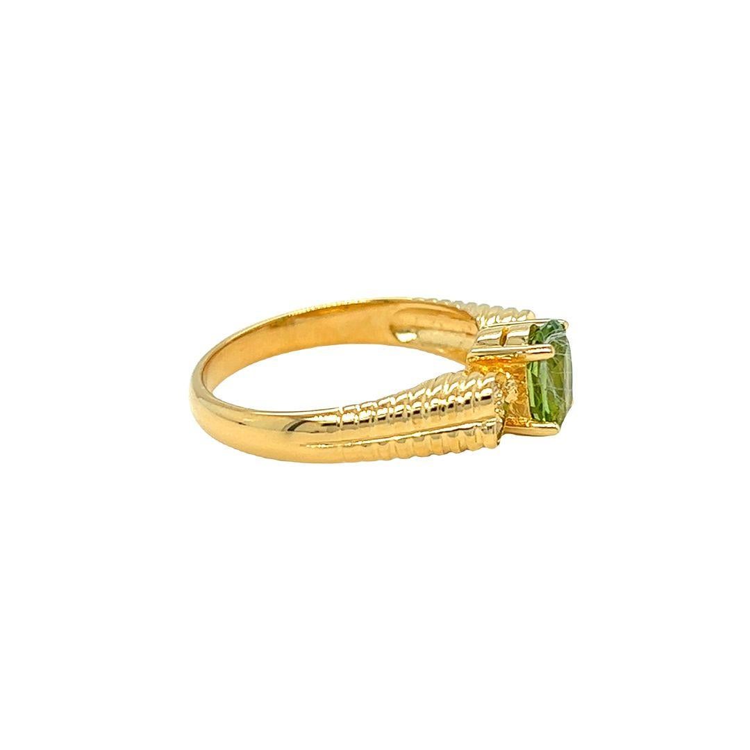 Oval Cut Nari Fine Jewels Oval Peridot and Diamond Ring Heart Accent 14K Yellow Gold For Sale