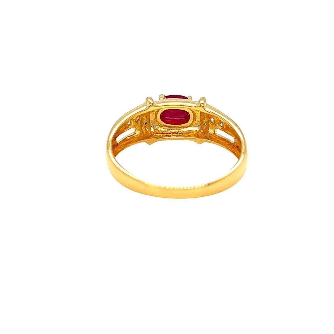 Oval Cut Nari Fine Jewels Oval Ruby and Diamond Ring 14K Yellow Gold For Sale