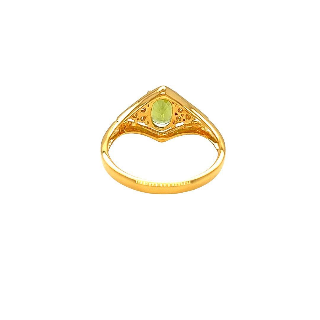 Oval Cut Nari Fine Jewels Peridot and Diamond Chevron Accents Ring 14K Yellow Gold For Sale