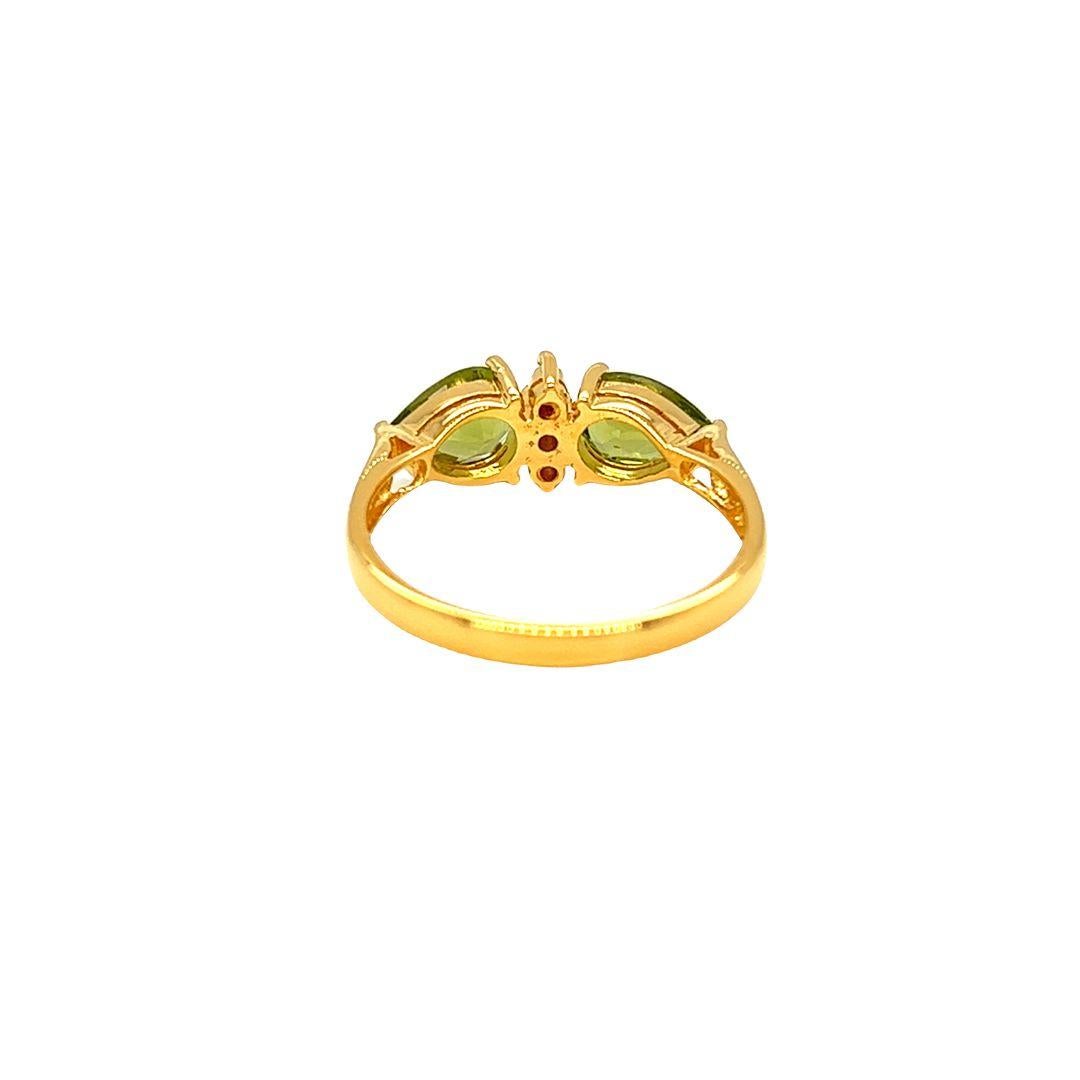 Pear Cut Nari Fine Jewels Twin Pear Shaped Peridot and Diamond Ring 14K Yellow Gold For Sale